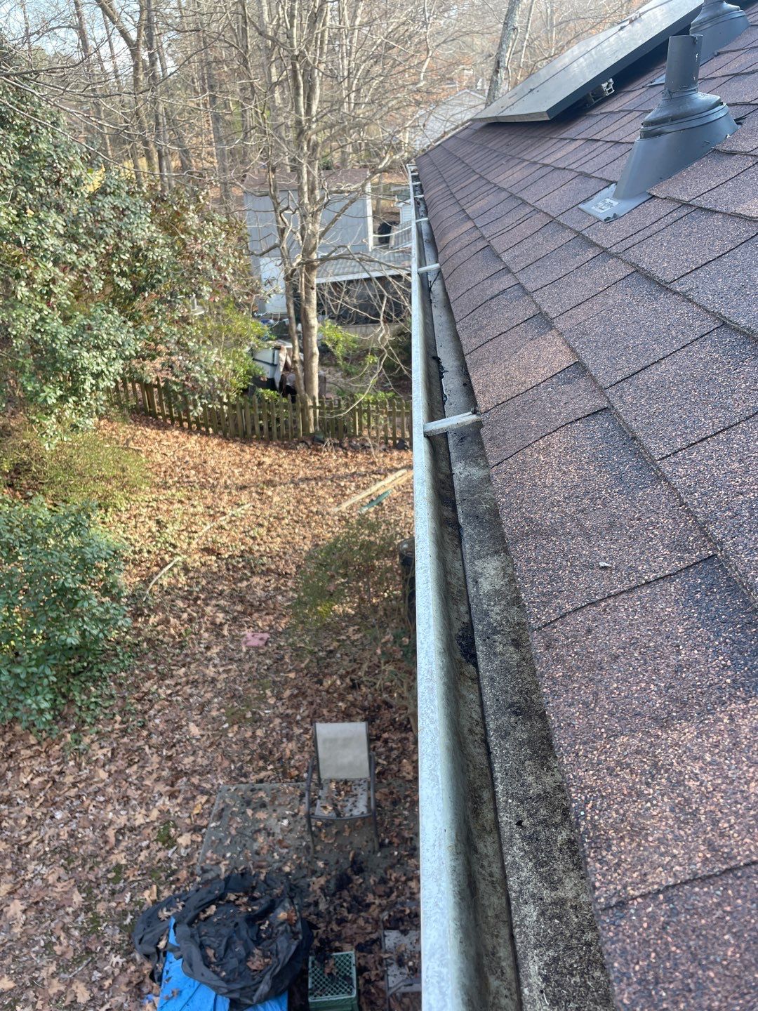 Cleaning Gutters  by Deerfield Roofing LLC