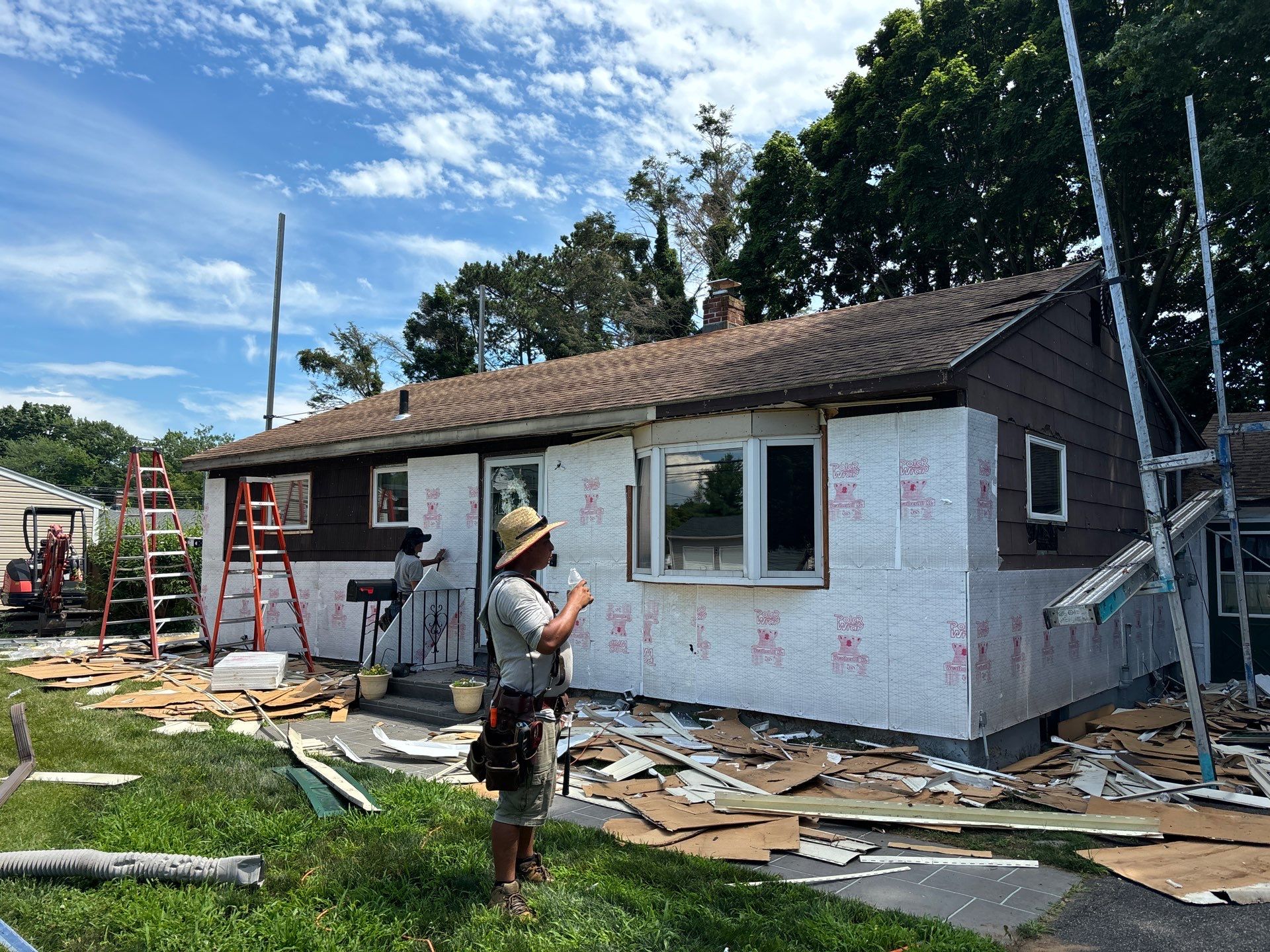 Siding Installation using Clapboard Monogram D4 Cypress by A Plus Exterior
