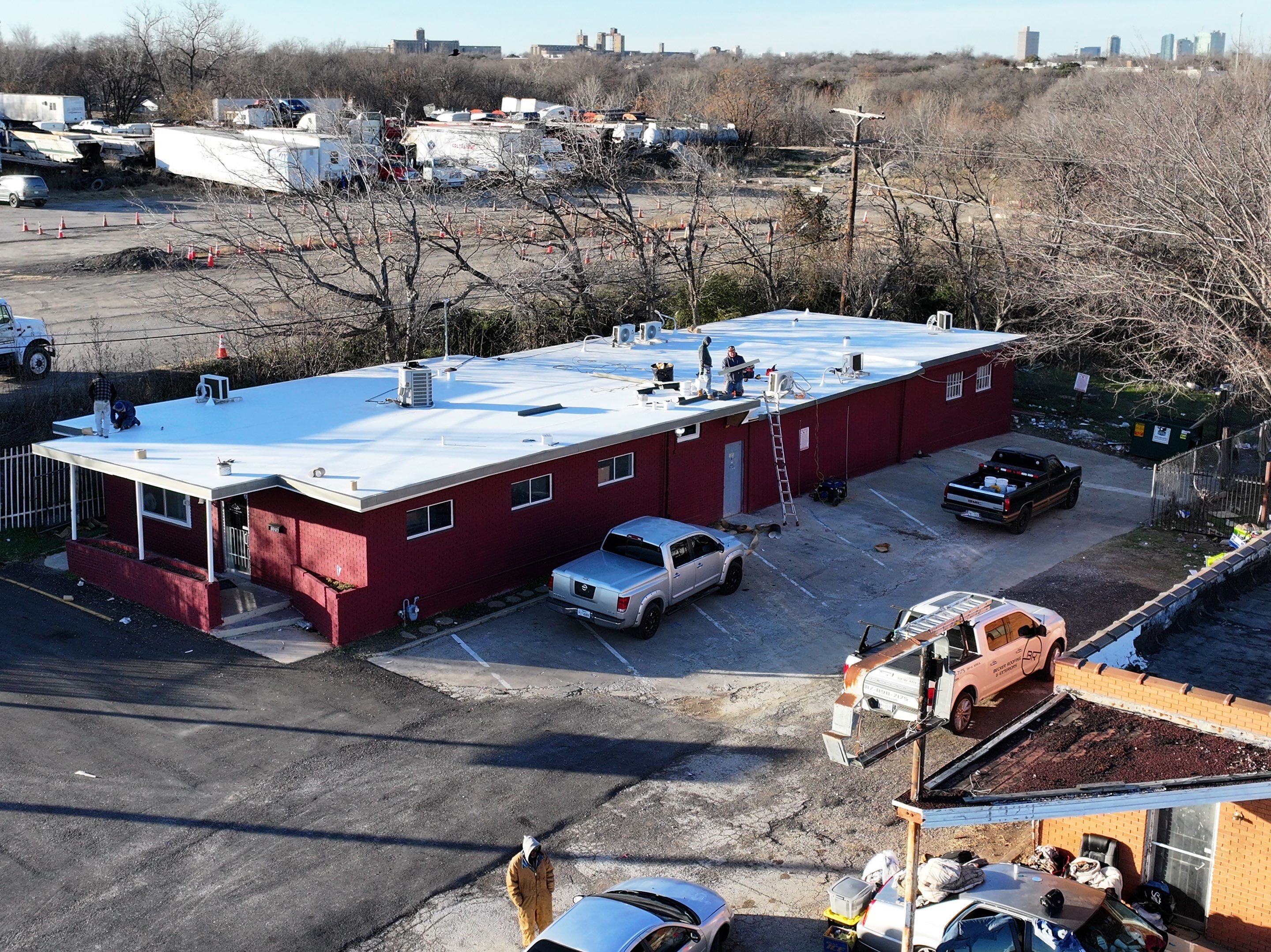 Commercial roofing overlay using GAF TPO over an old ballast roof by Becker Roofing and Exteriors