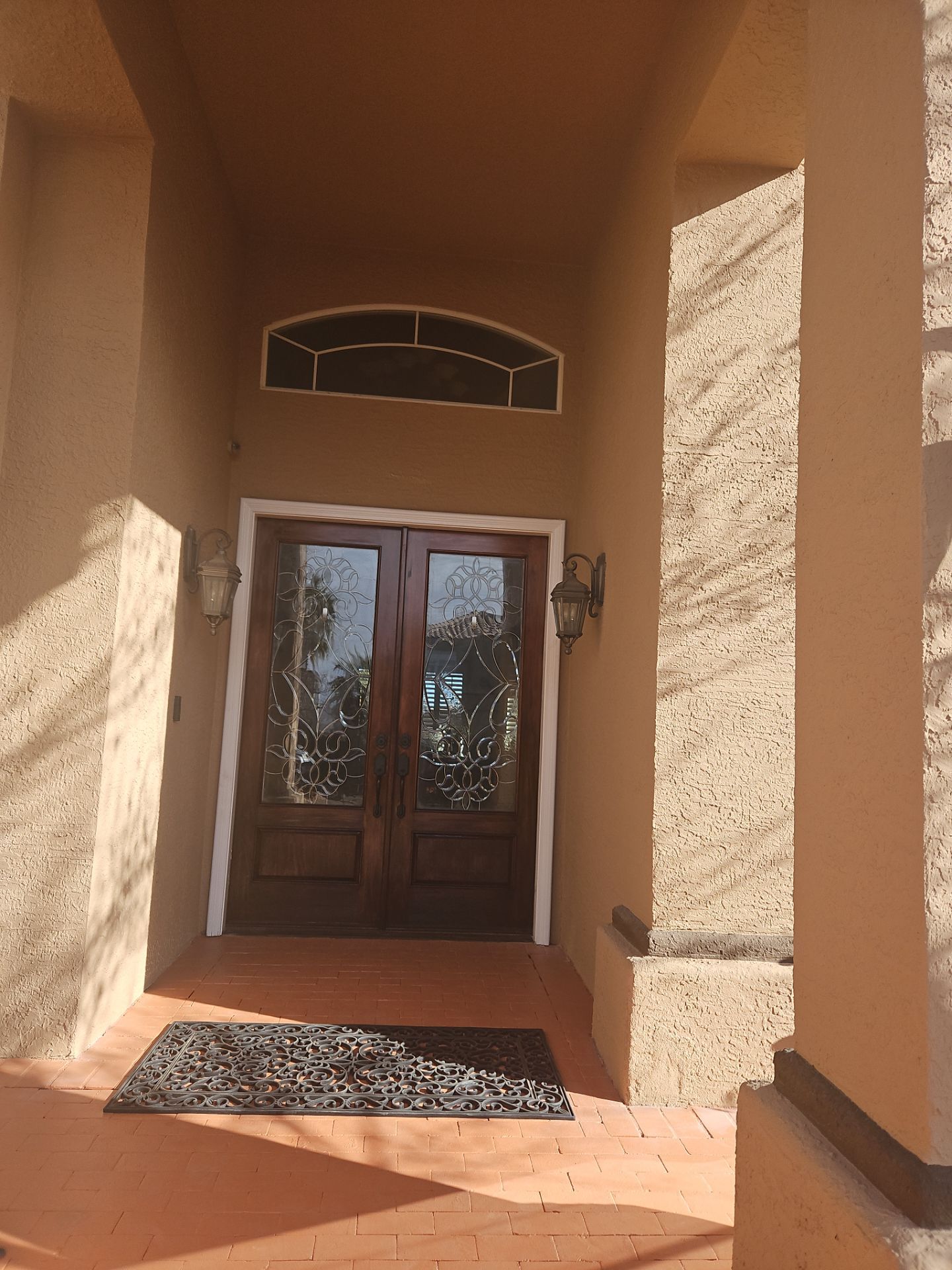 Interior and Exterior Patio, Doors, and Concrete Stain by Regal Renovate