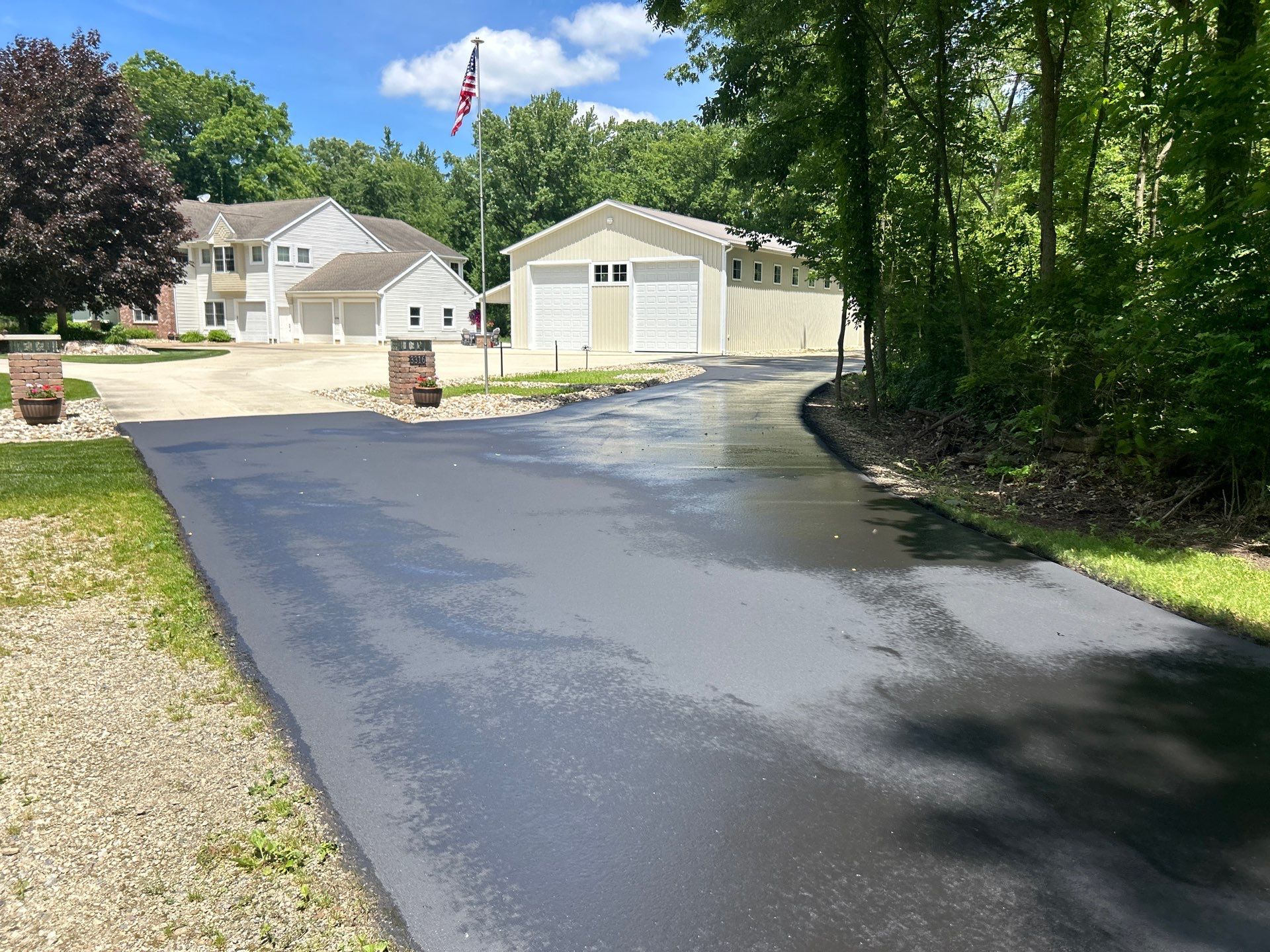 High end residential driveway by Quality Asphalt & Maintenance LLC