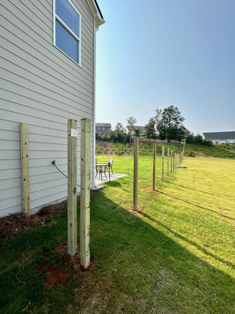 Fence Installation of Capped Wood Privacy by Titans of Timber Fence & Stain