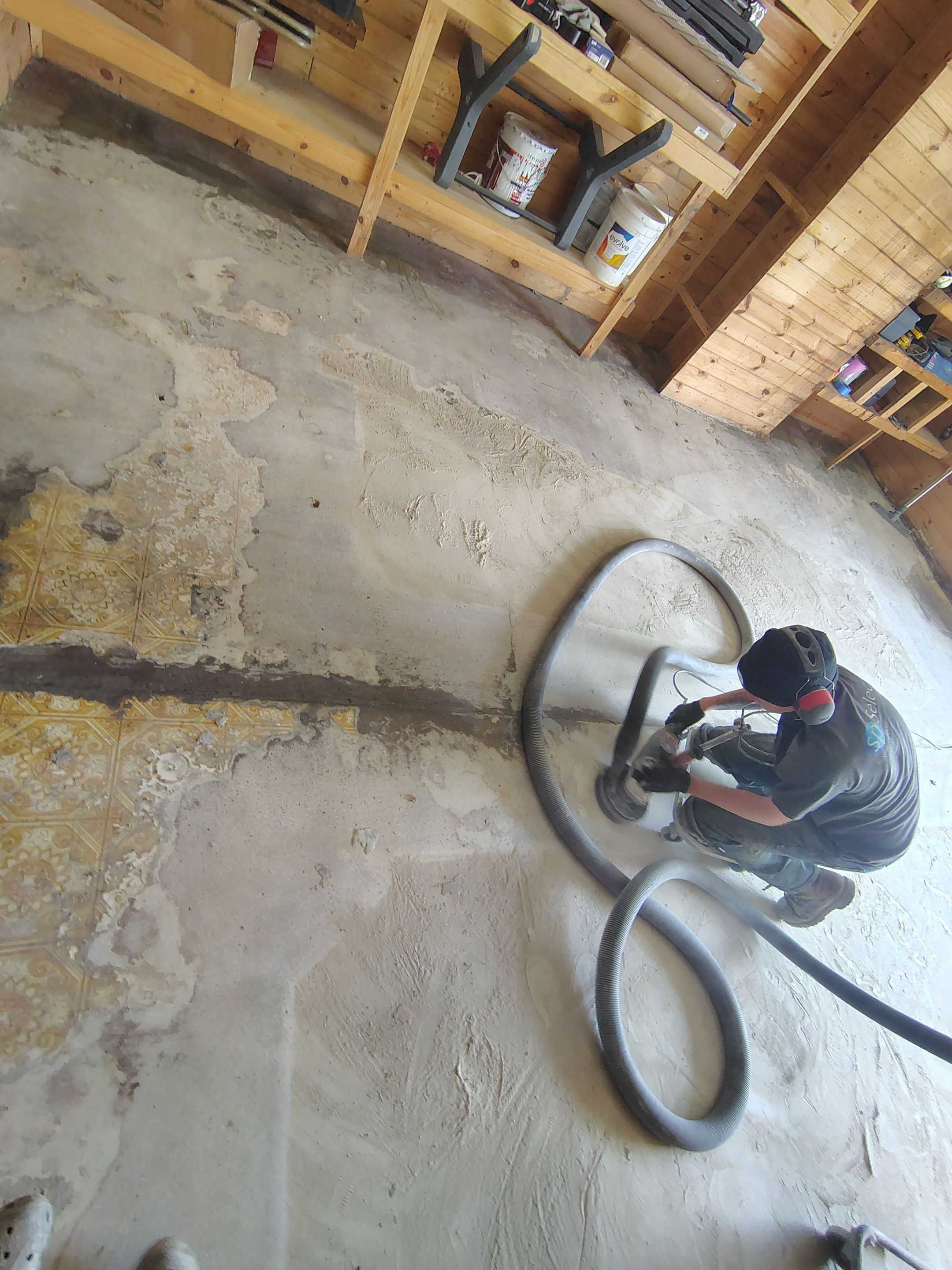 Commercial Epoxy Flake Floor Coating in Emmetsburg, Iowa by Select Painting, Coatings & Garage Cabinets