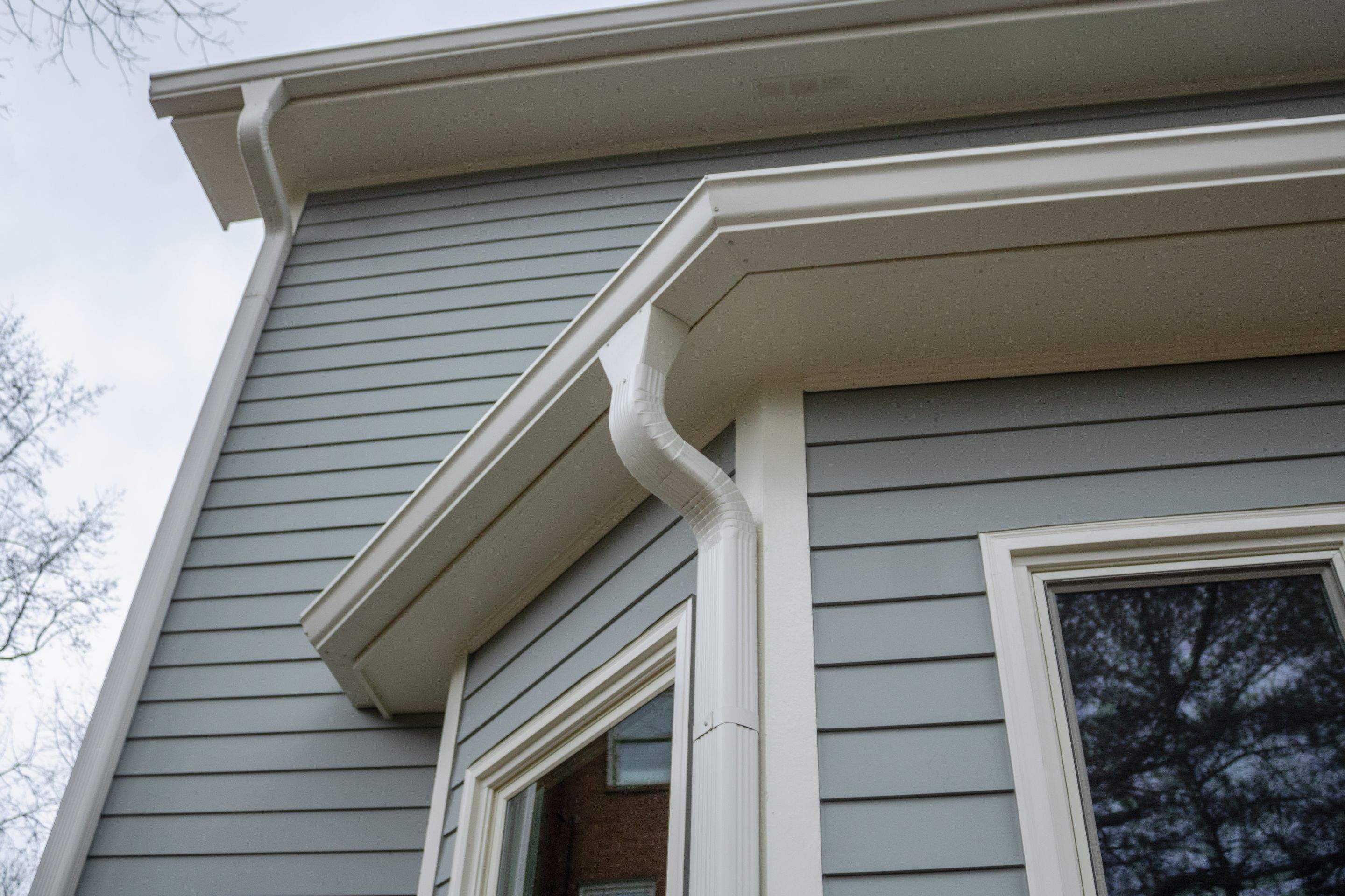 James Hardie Siding Replacement, Exterior Painting, Deck Stain, and Gutter Installation in Peachtree Corners, GA by Nelson Exteriors