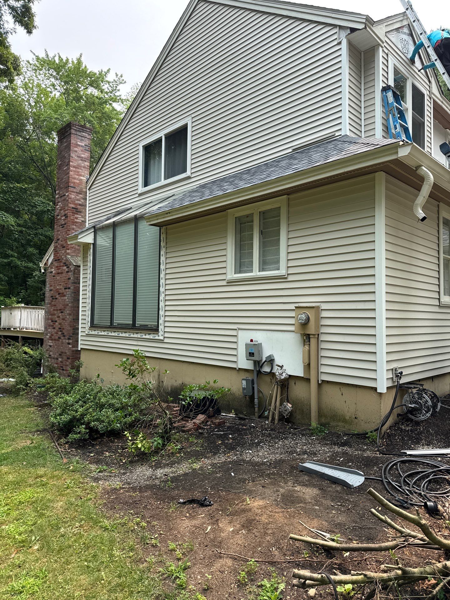 Complete Exterior Remodel in Stratham, NH Near Turnberry Road with Roofing, Siding, Windows, Gutters, and PVC Trim by Compass exteriors