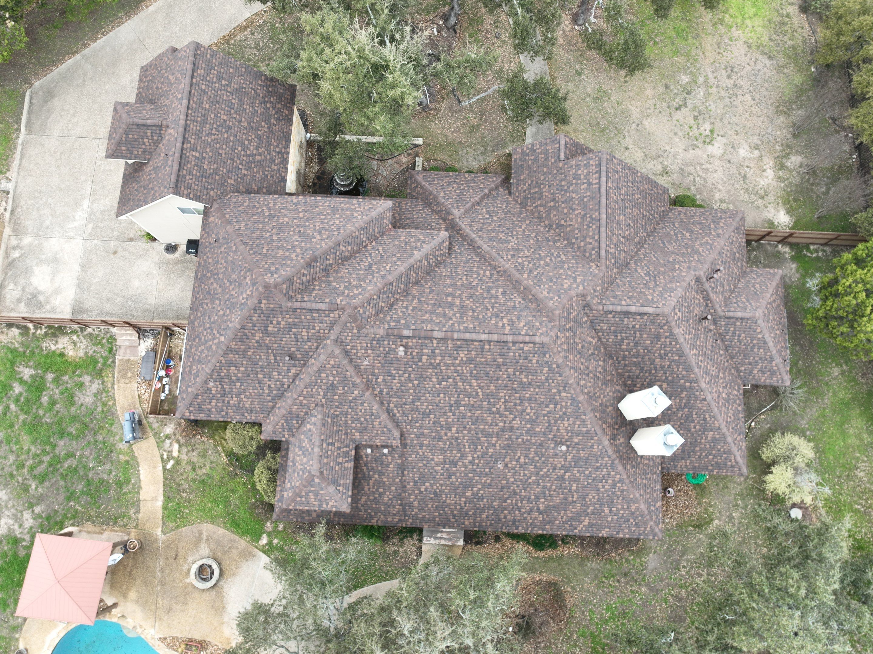 Residential Roof Replacement using 30 Year Laminate Shingles with High Profile Ridge by Premier Roofing and Contracting