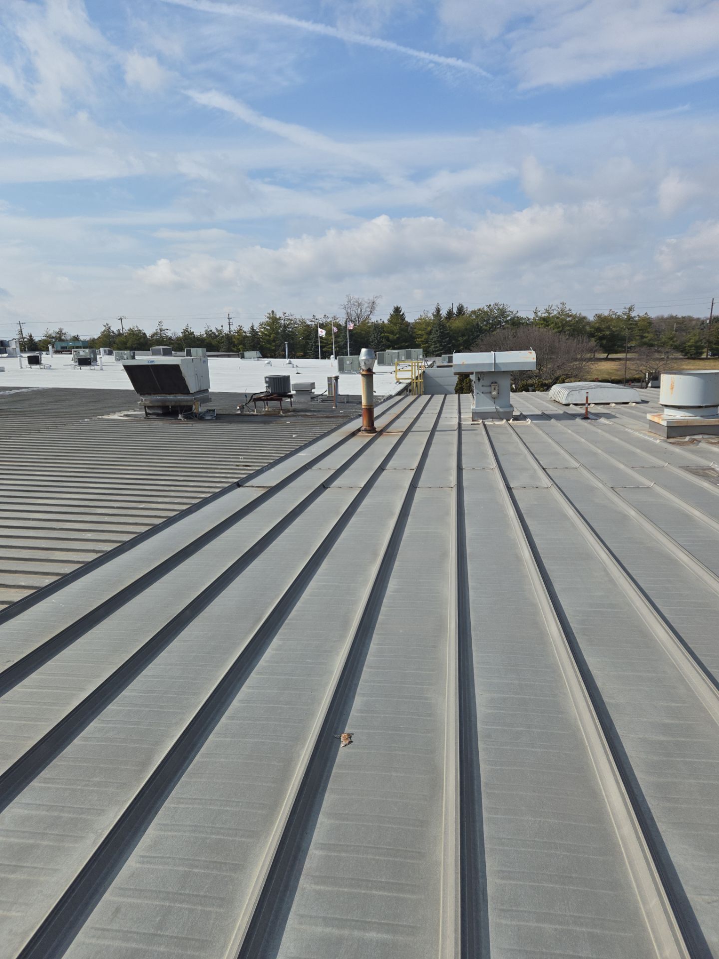 Commercial Metal and Flat Roof Repairs in Mason, Ohio by Level Up Roofing and Restoration Services LLC