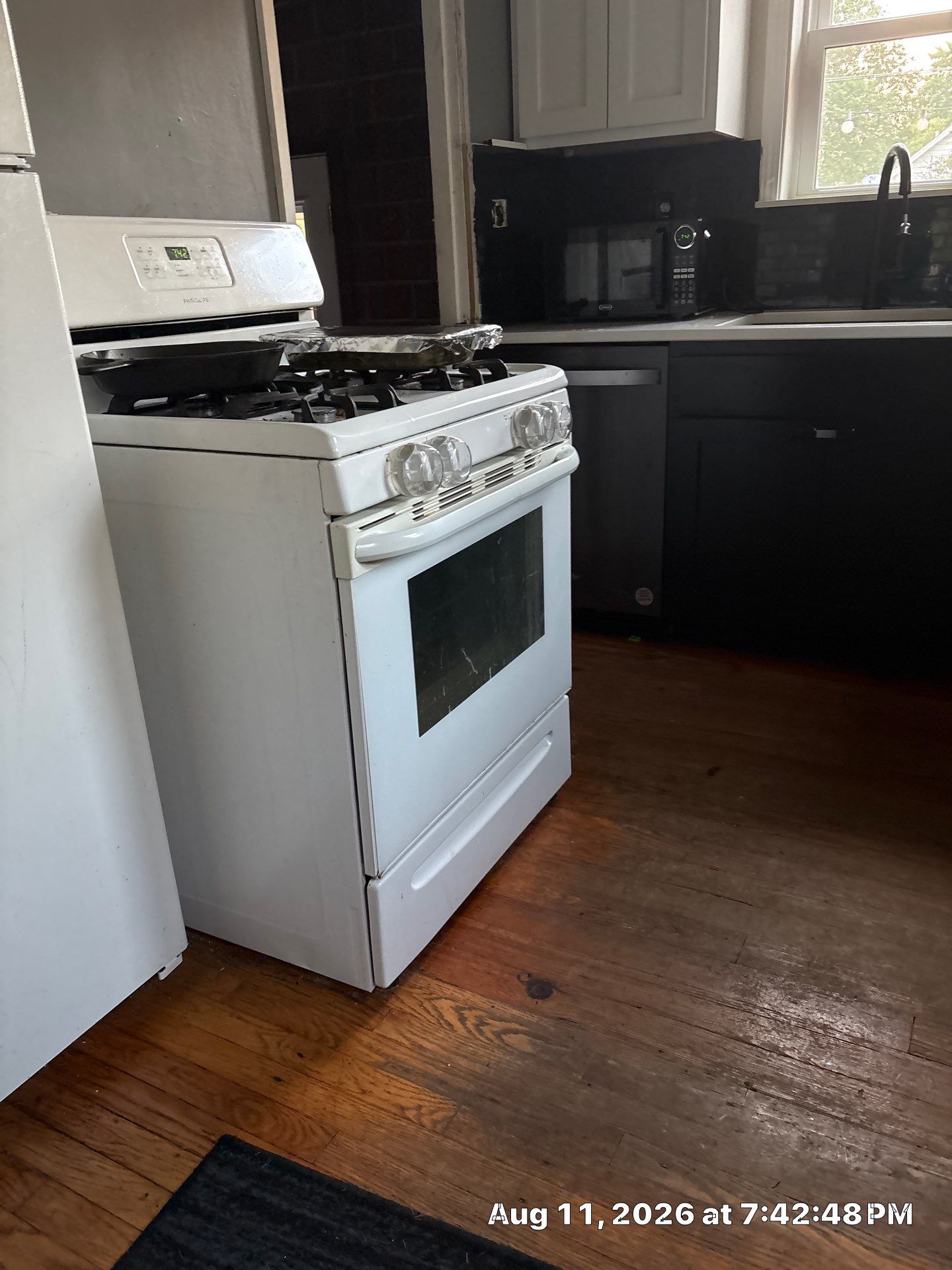Two-Tone Kitchen Remodel with Black Subway Tile in Lincoln by CompanyCam Sales Demo