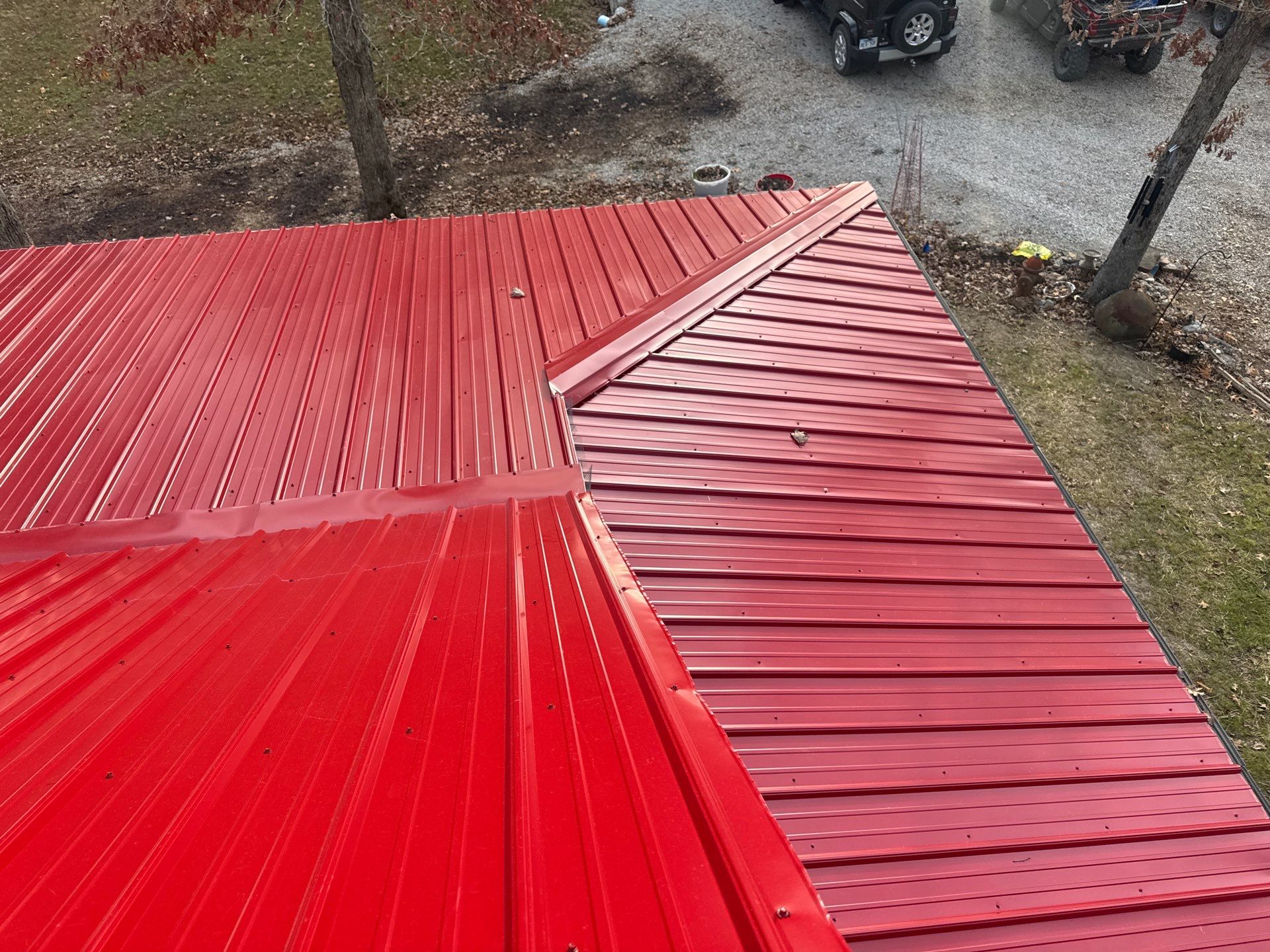 Residential Roofing Install - 29 Gauge G-Rib Metal - Color Dark Red  by Titan Commercial & Residential Roofing 