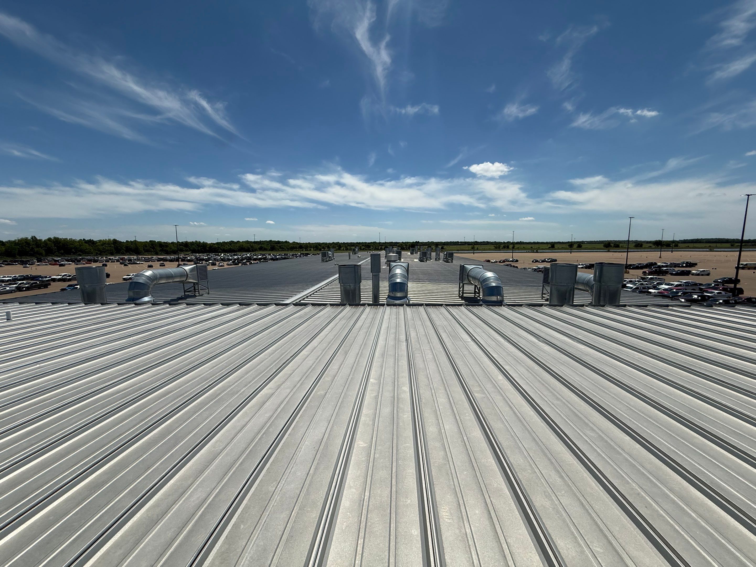 Commercial Metal Roof Repair and Skylight Sealing in West Memphis by Revival Roofing Services