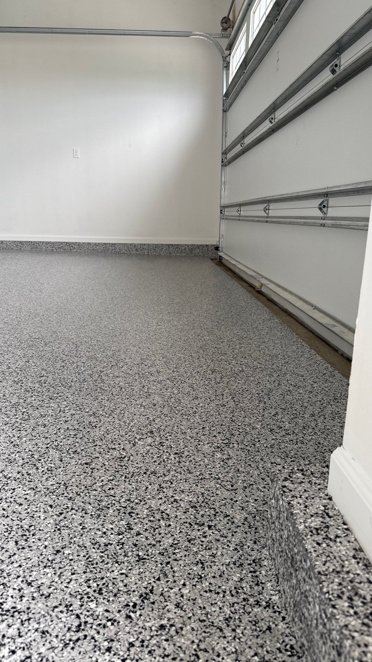 Kurt Got His Floor Done Before Move In, You Should Too  by Banner Garage