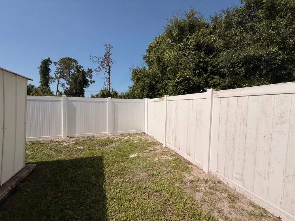 White Vinyl Privacy Fence Repair and Replacement in North Port by True Fence LLC