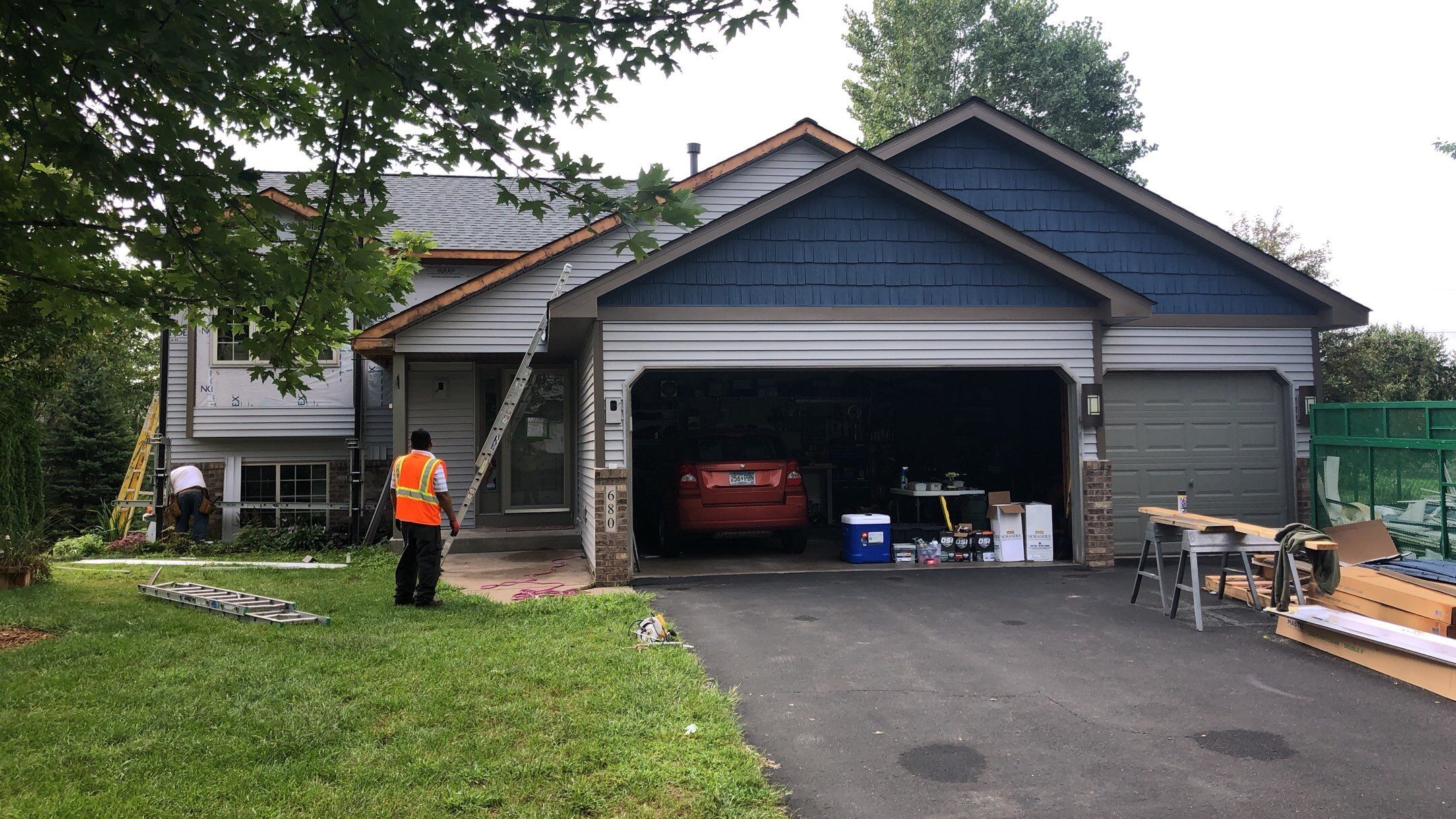 Storm Damage Restoration using Atlas Pinnacle Shingles and Mastic Vinyl Siding  by MODERN EXTERIOR SYSTEMS