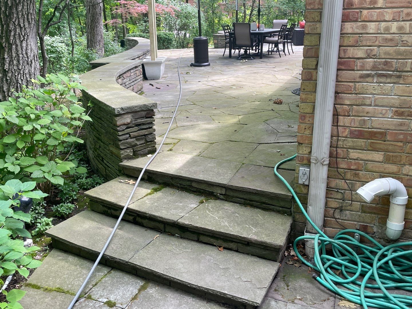 Bluestone patio cleaning by Northern Power Washing LLC.
