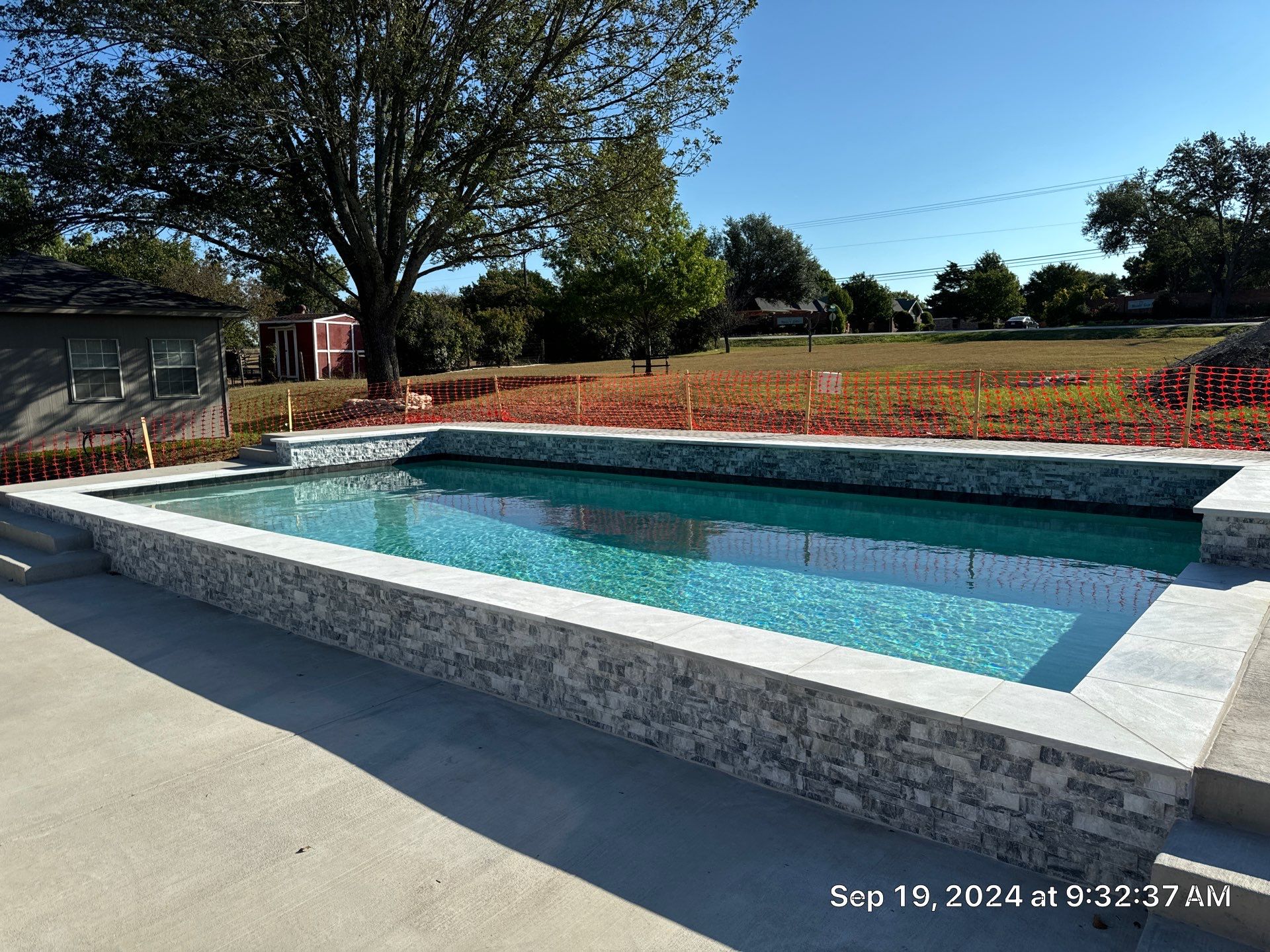 Large Modern Rectangular Pool with Tanning Ledge by Pinnacle Pools and Spas - DFW