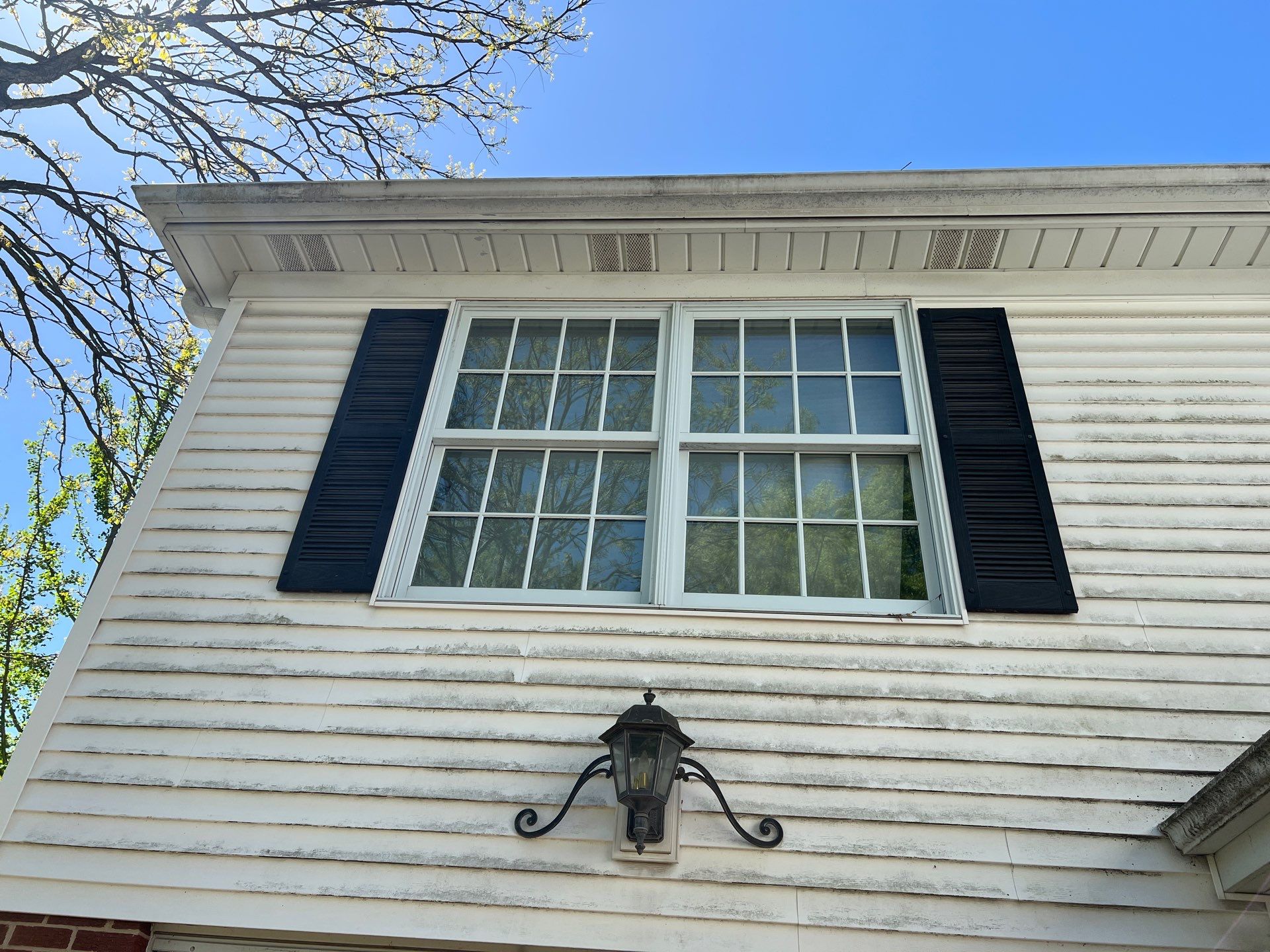 Housewashing  using Algaecide, soft wash soap by Northern Power Washing LLC.