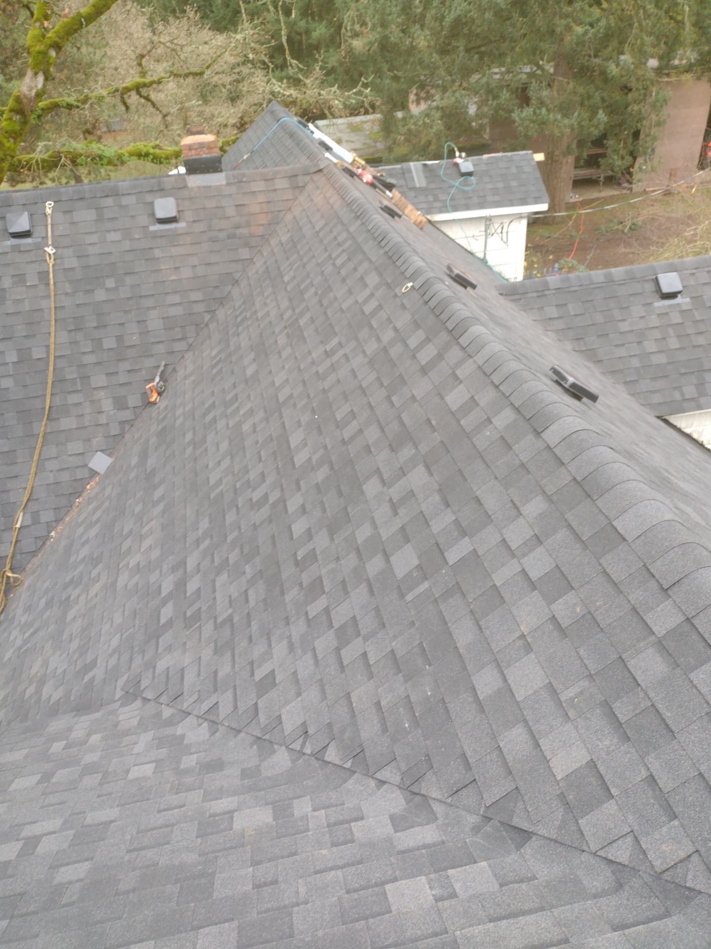 Residential Roofing Installation using IKO Dynasty (Color: Granite Black) by Orezona Building & Roofing Company, Inc.