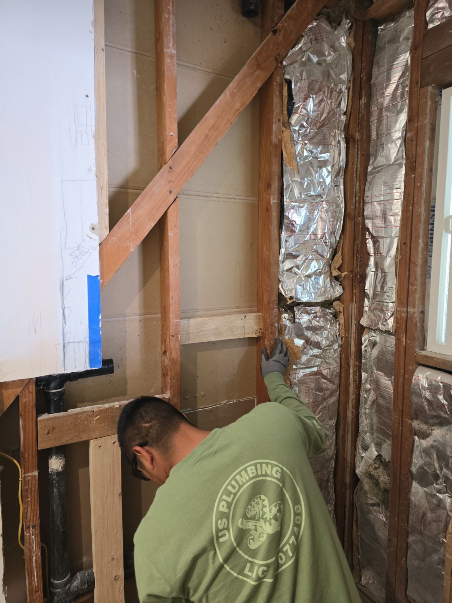 Installation of New Tall Black Piping (Wall to Ceiling) & Underground Piping by Us Plumbing