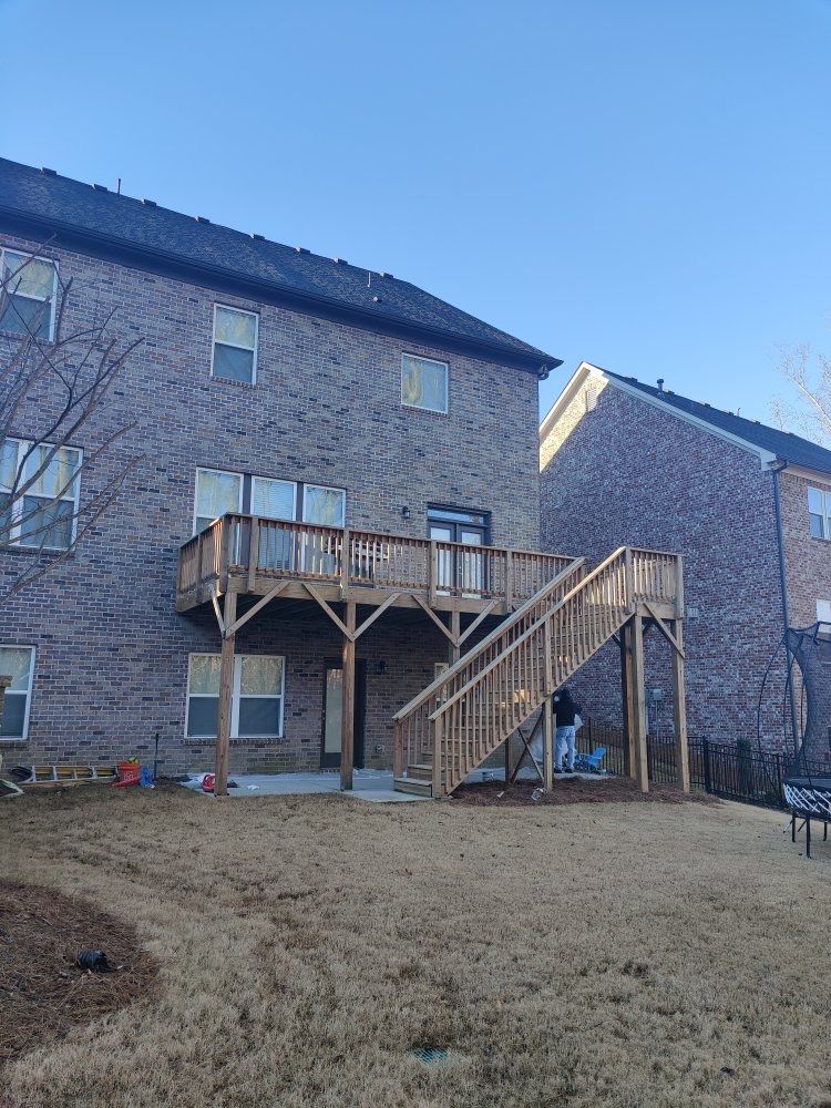 Dark Wood Deck Staining and Refinishing in Suwanee by Swift Home Renovations