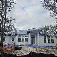 24ga 1.5" Mechanical Seam Matte Black by Total Roofing System The Metal Roof Experts