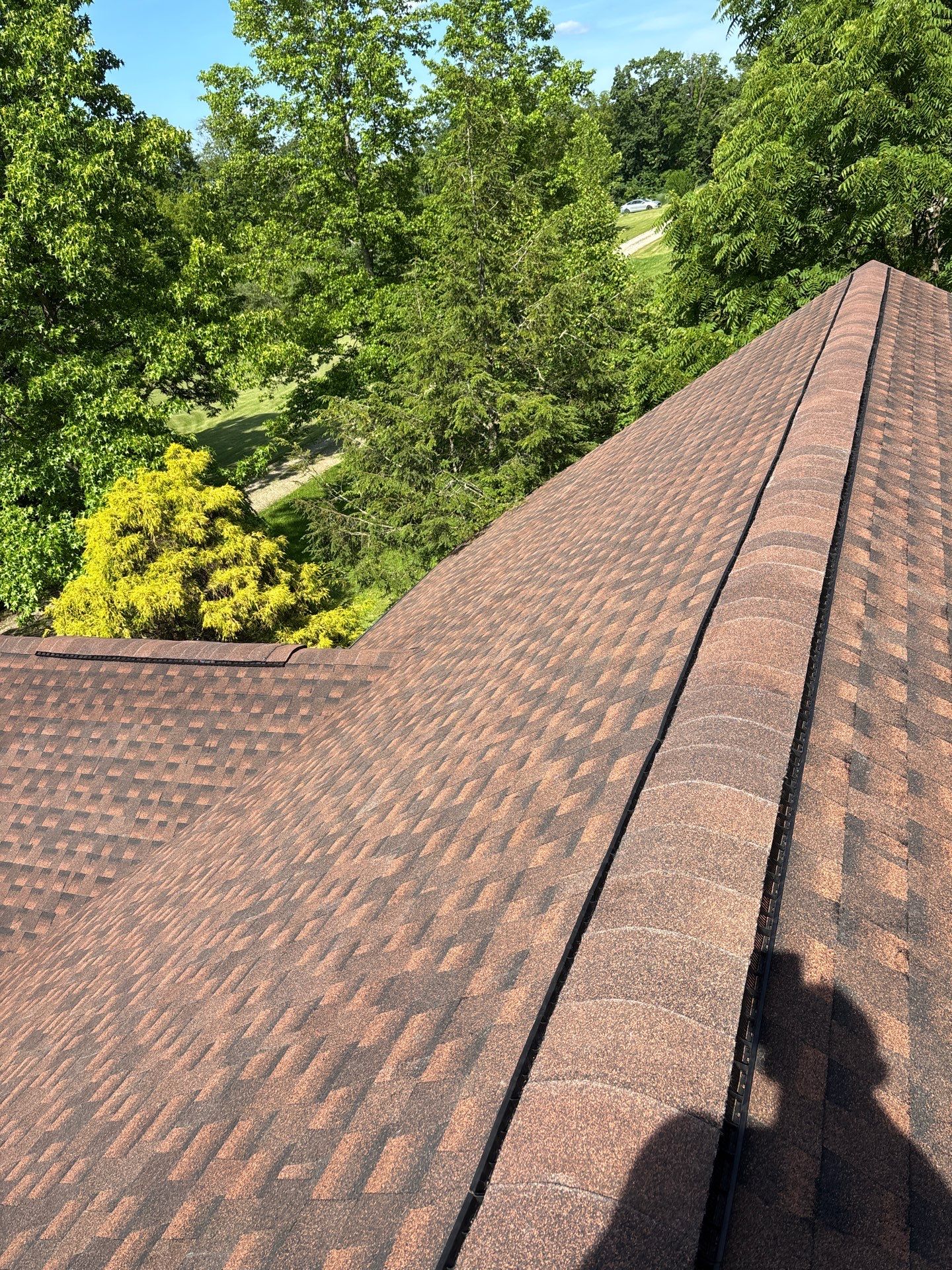 Residential Roofing Installation using GAF TImberline HDZ Hickory by Rainstoppers Roofing