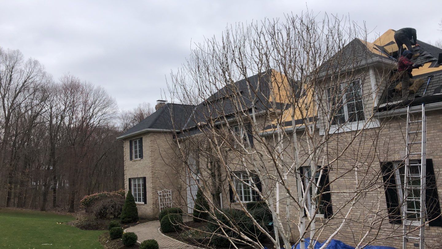 Residential Roofing Installation using Owens Corning TruDefinition Onyx Black by A Plus Exterior