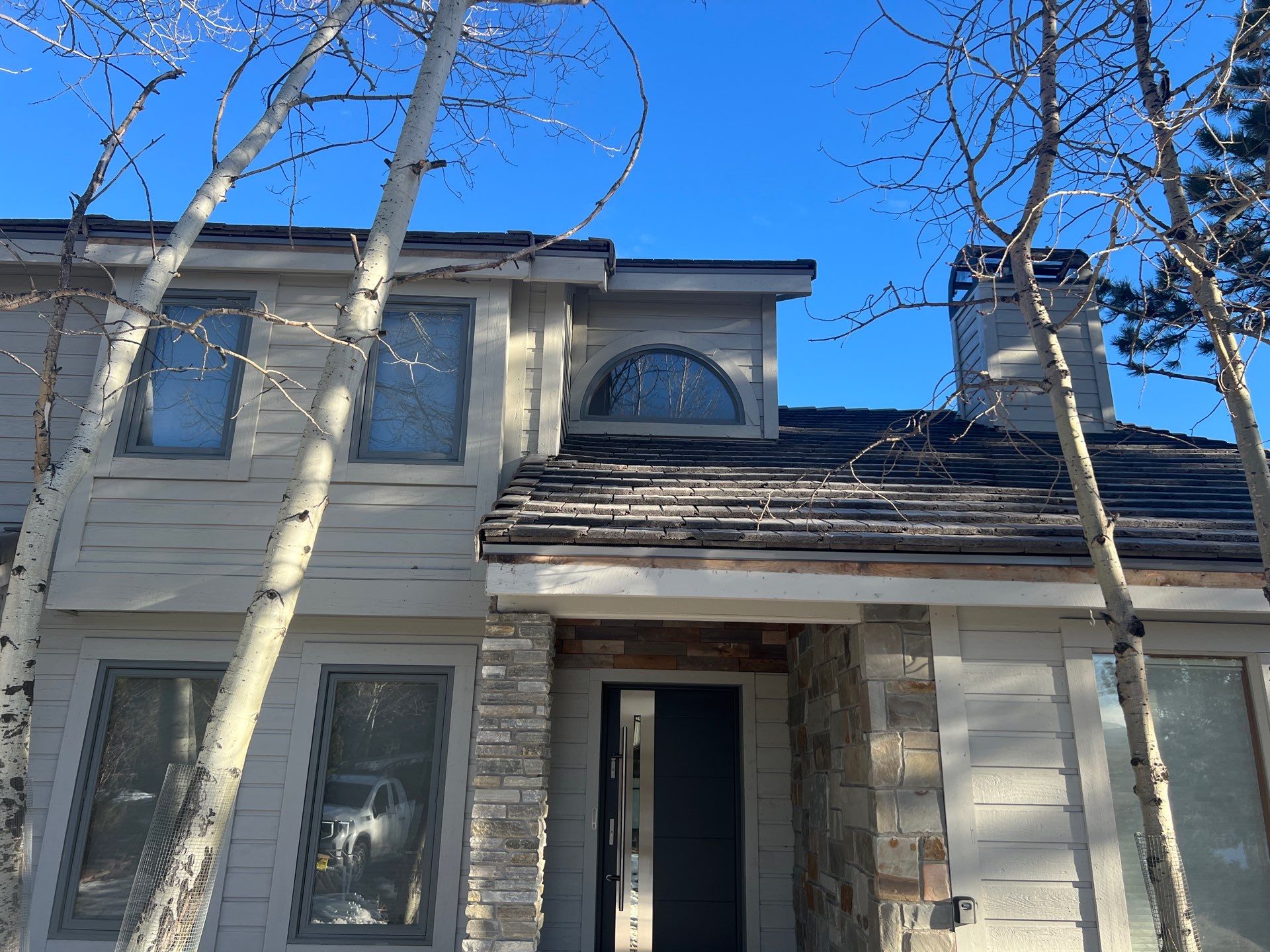 Residential Roofing Installation using Concrete Tile by Blue Peaks Roofing LLC 