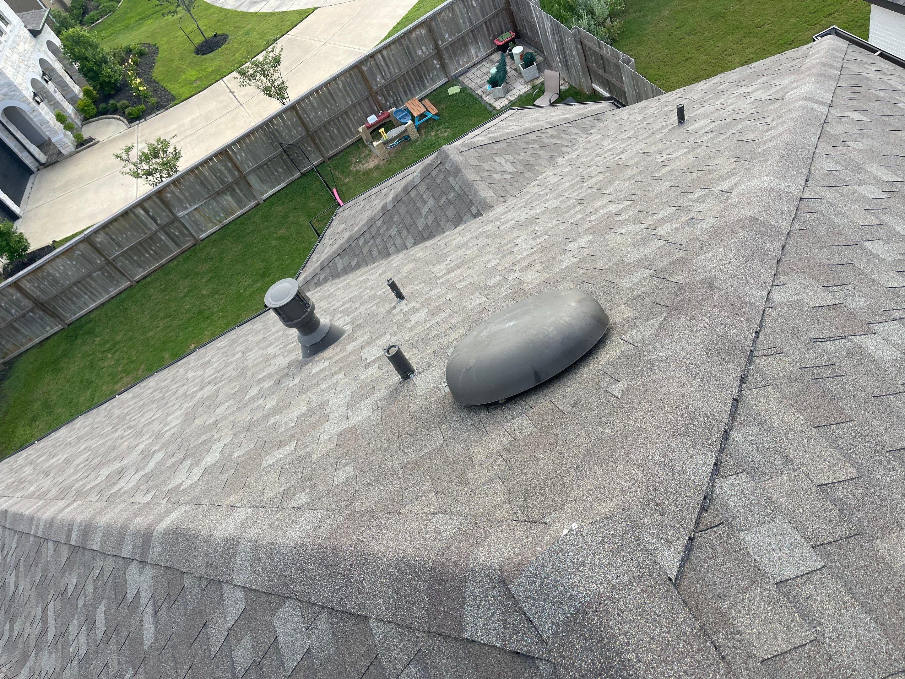 Hail Damage using Owen's Corning Duration (Lifetime) Shingles by Roof Repair Company