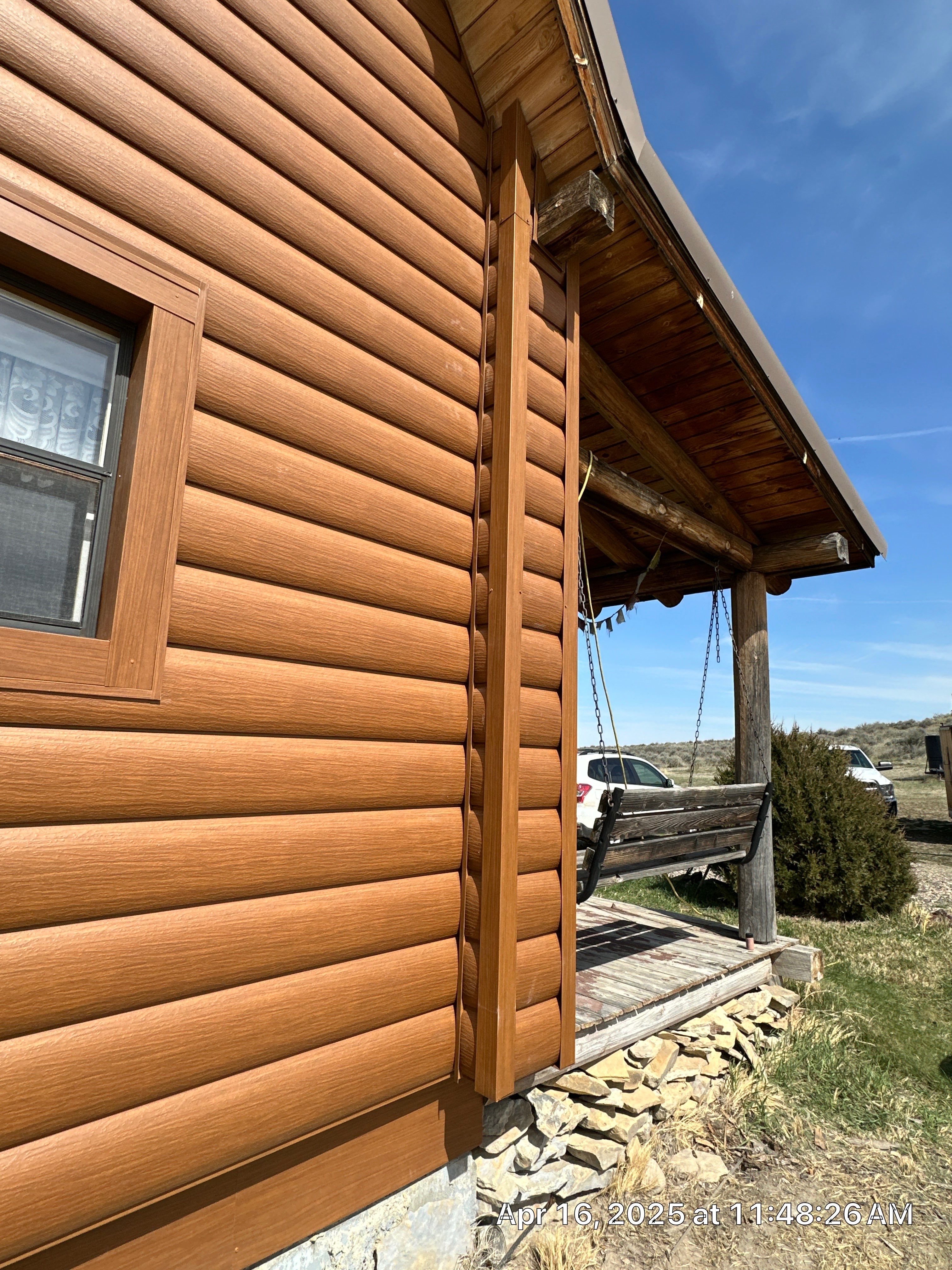 Siding Installation using Log Siding by Lynnrich Seamless Siding, Windows & Doors
