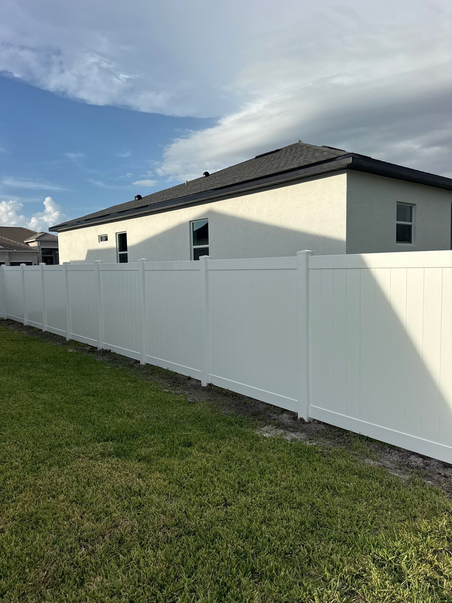 Residential Vinyl Privacy Fence Installation in Port Charlotte by True Fence LLC