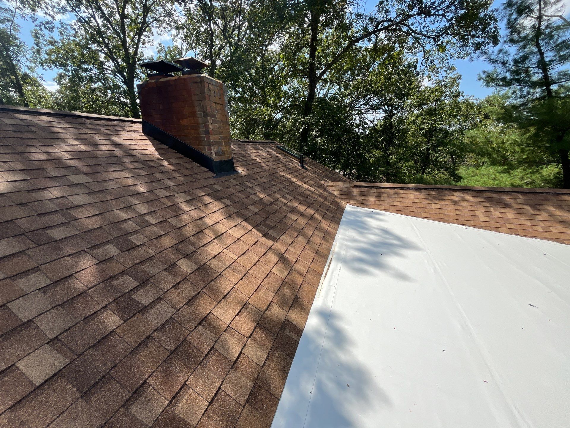 Residential Shingle & Flat Roof Installation by Titan Commercial & Residential Roofing 