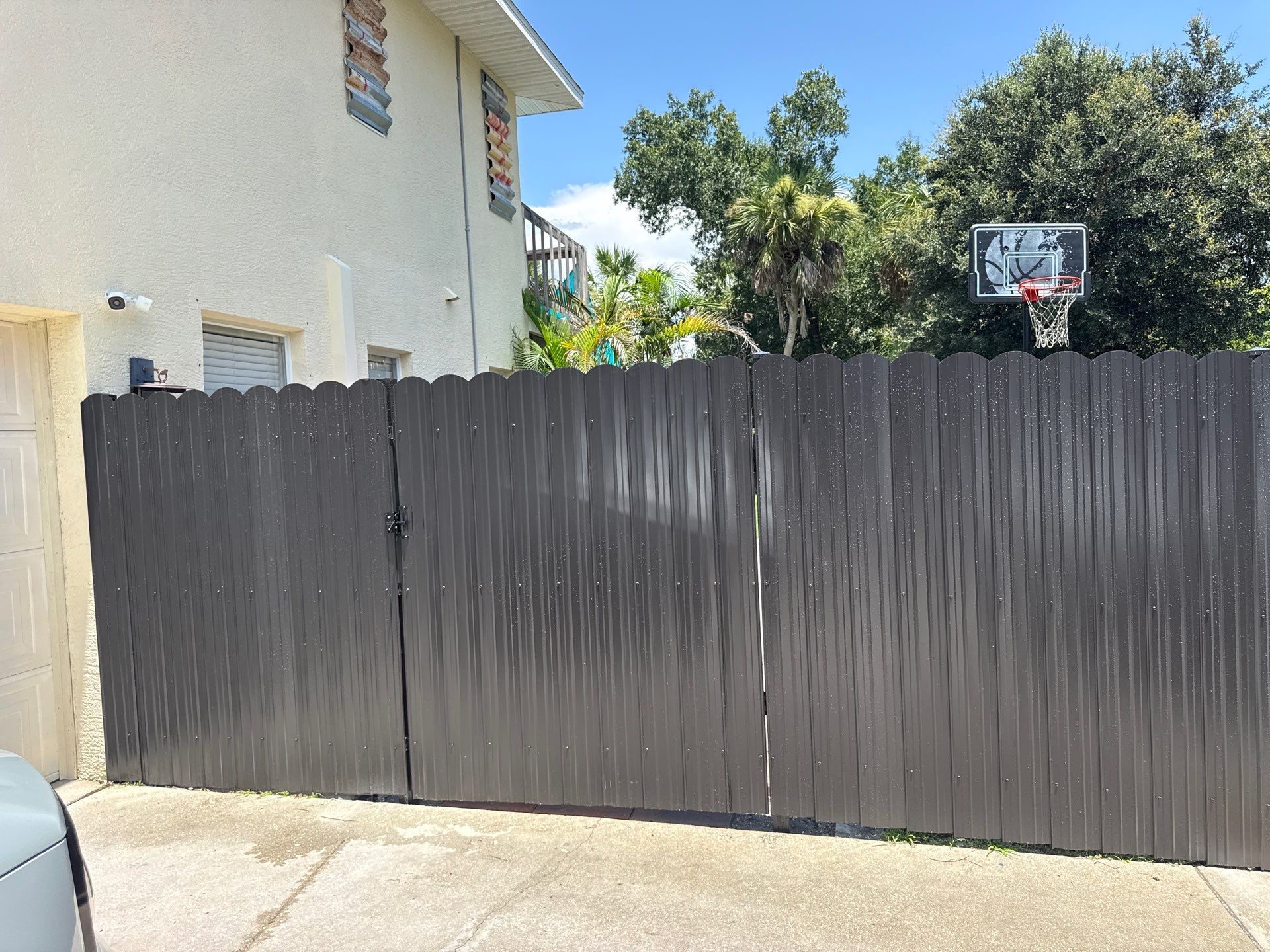 Bronze Scalloped Metal Privacy Fence Installation in North Port by True Fence LLC