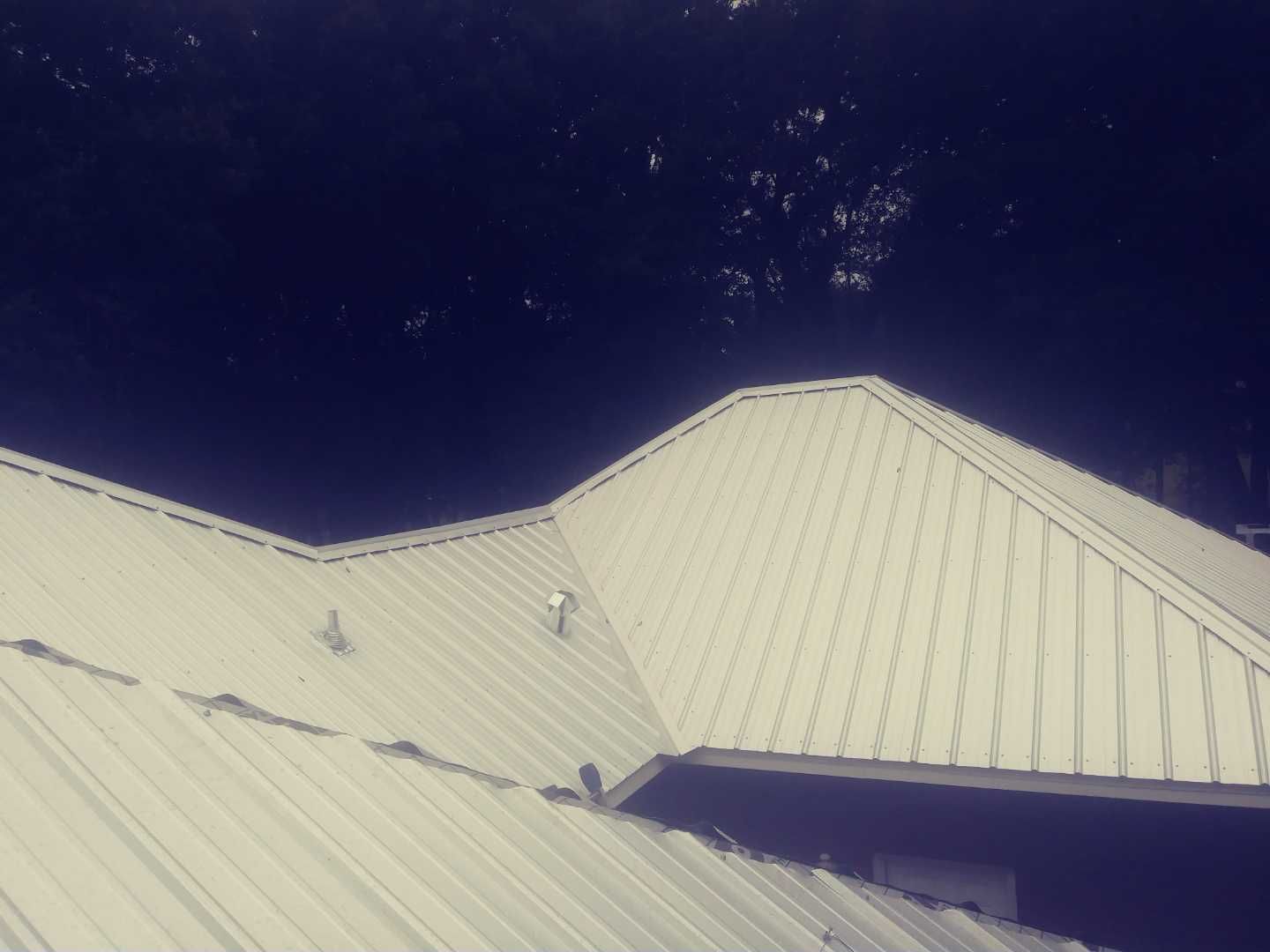 Residential Roofing Installation using Metal roofing by American Roofing & Construction LLC
