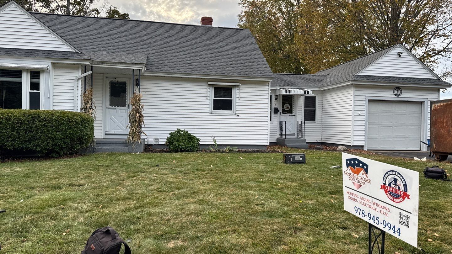 Complete Roof Replacement with GAF Pewter Gray HDZ™ Shingles, VELUX Skylights & New Gutters by Sensible Home Solutions