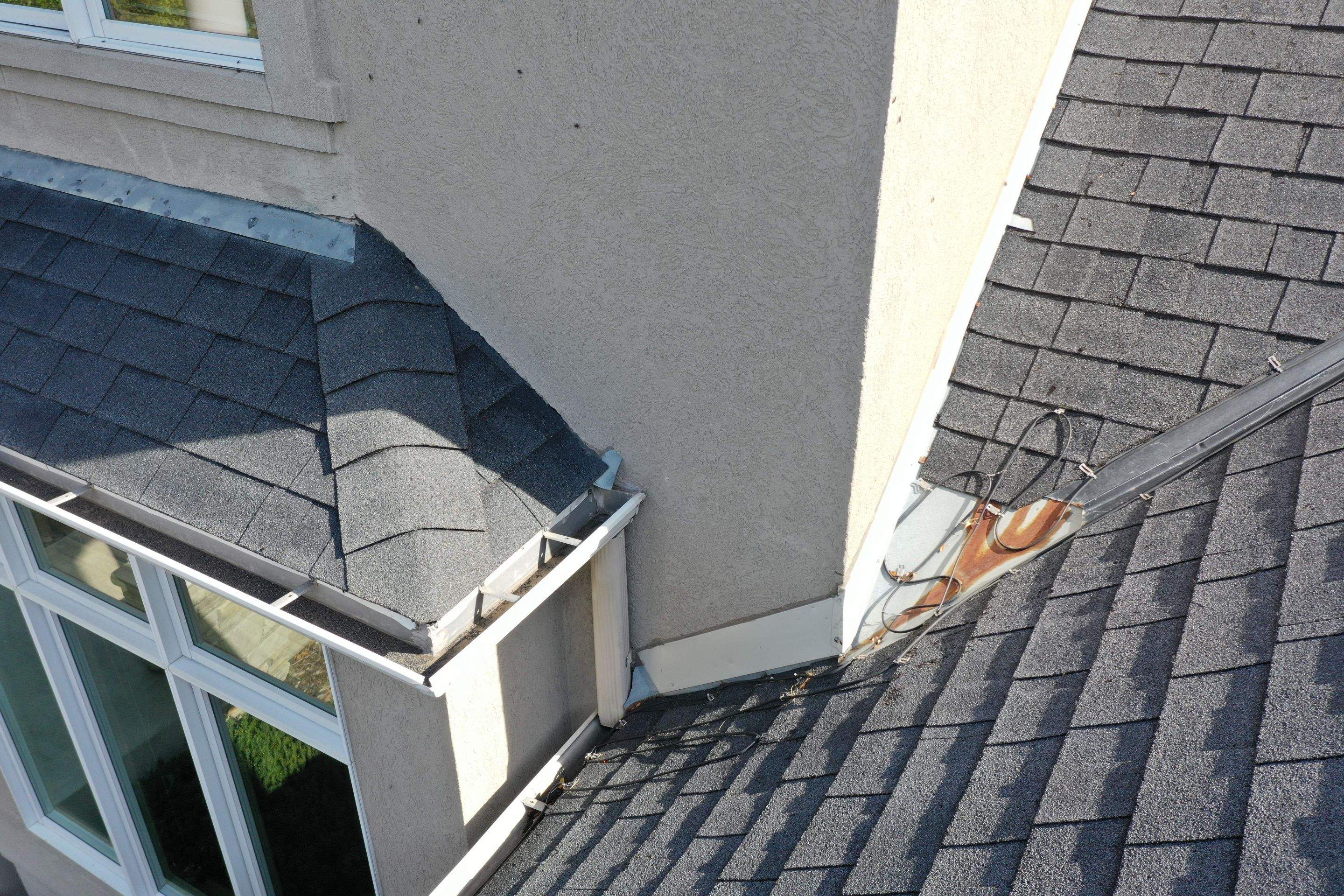 Residential Roofing Installation using Certainteed Landmark Moire Black by MODERN EXTERIOR SYSTEMS