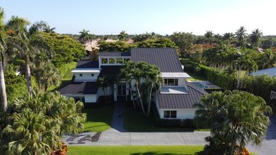 Residential Roofing Installation using 1" Nail strip metal roof