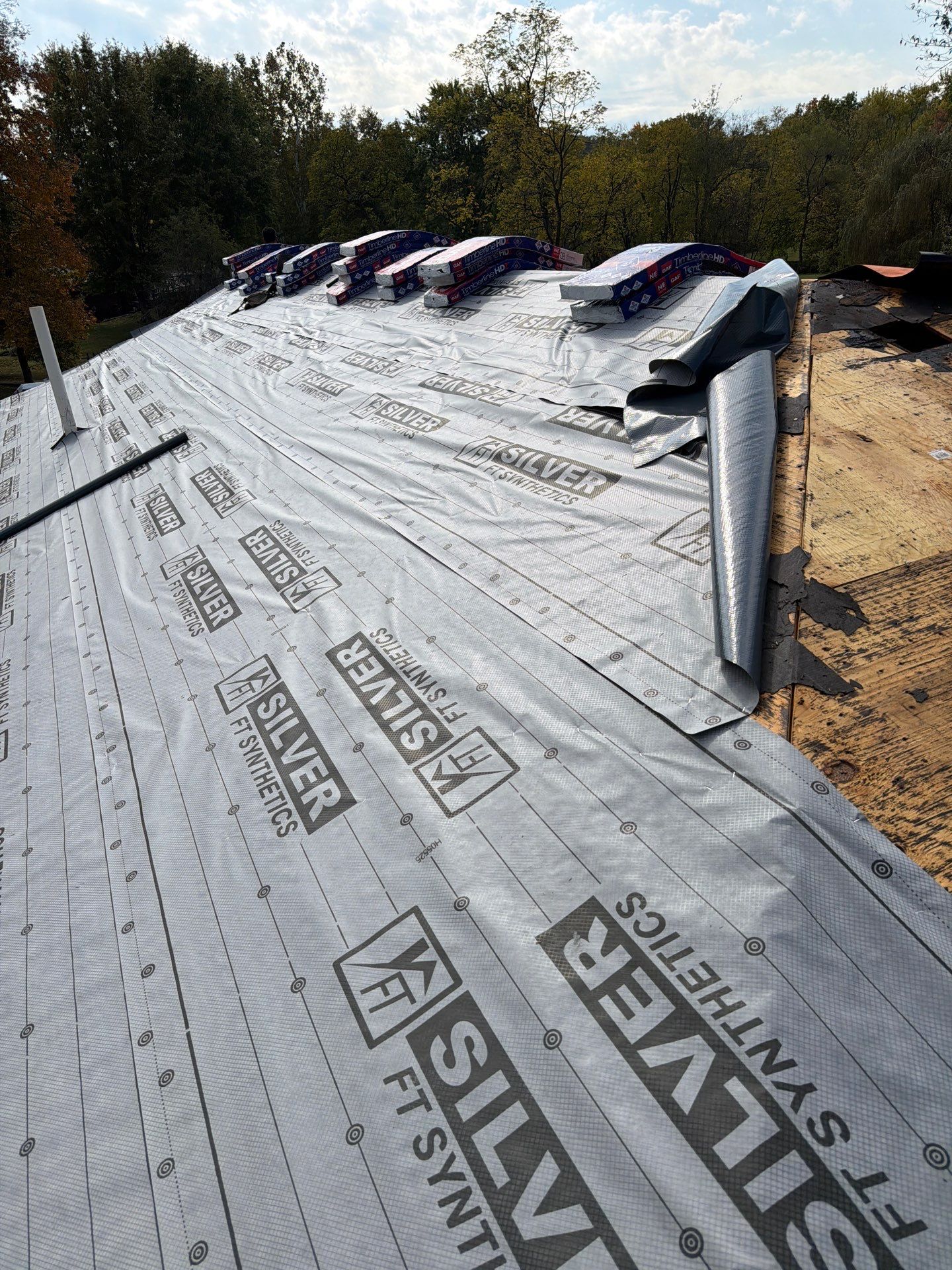 Residential Roofing Installation using GAF Timberline HDZ Shakewood by Rainstoppers Roofing