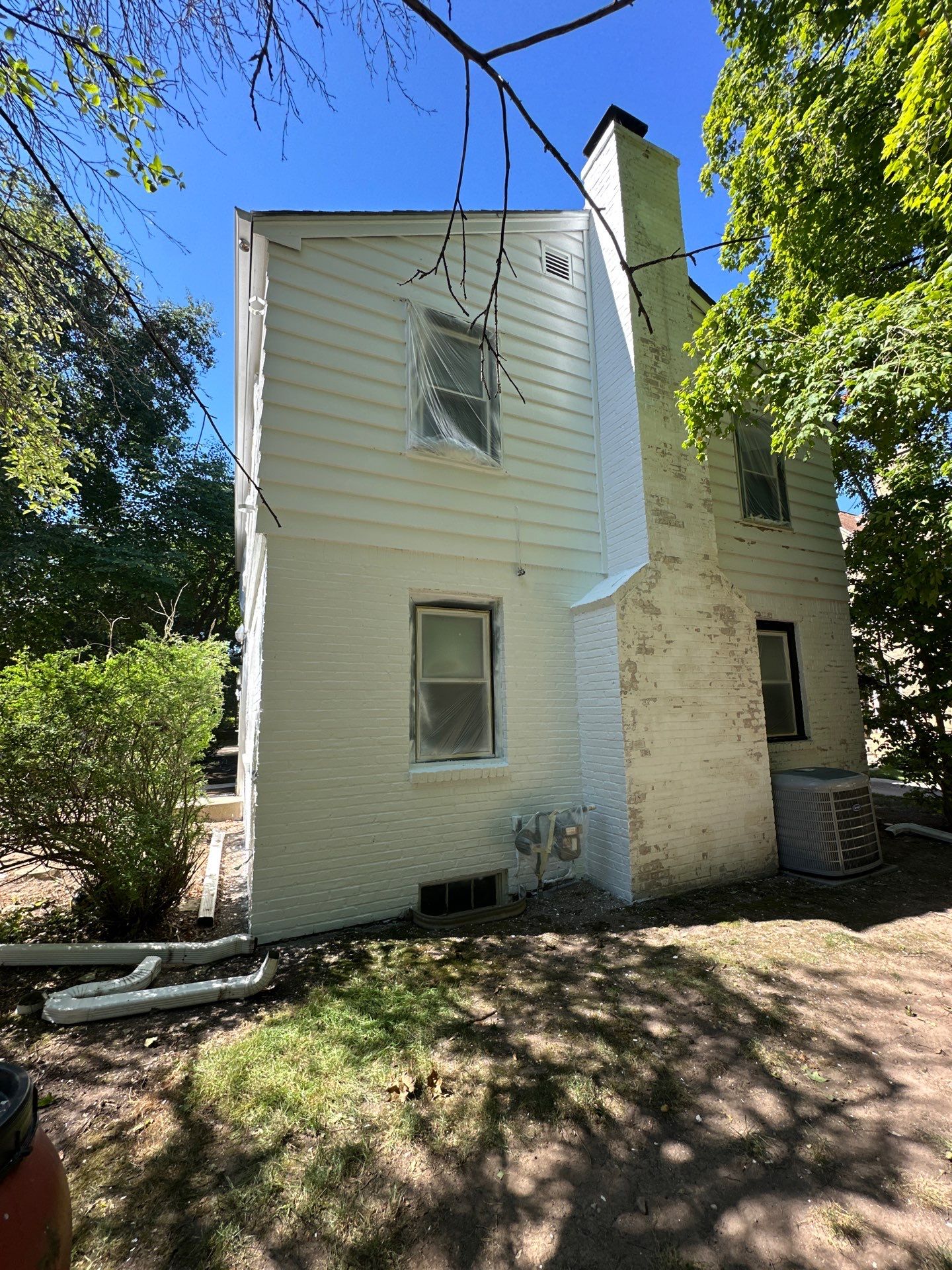 Shorewood Exterior Painting and Siding Refresh With Contrast Trim by OCS Contracting Services