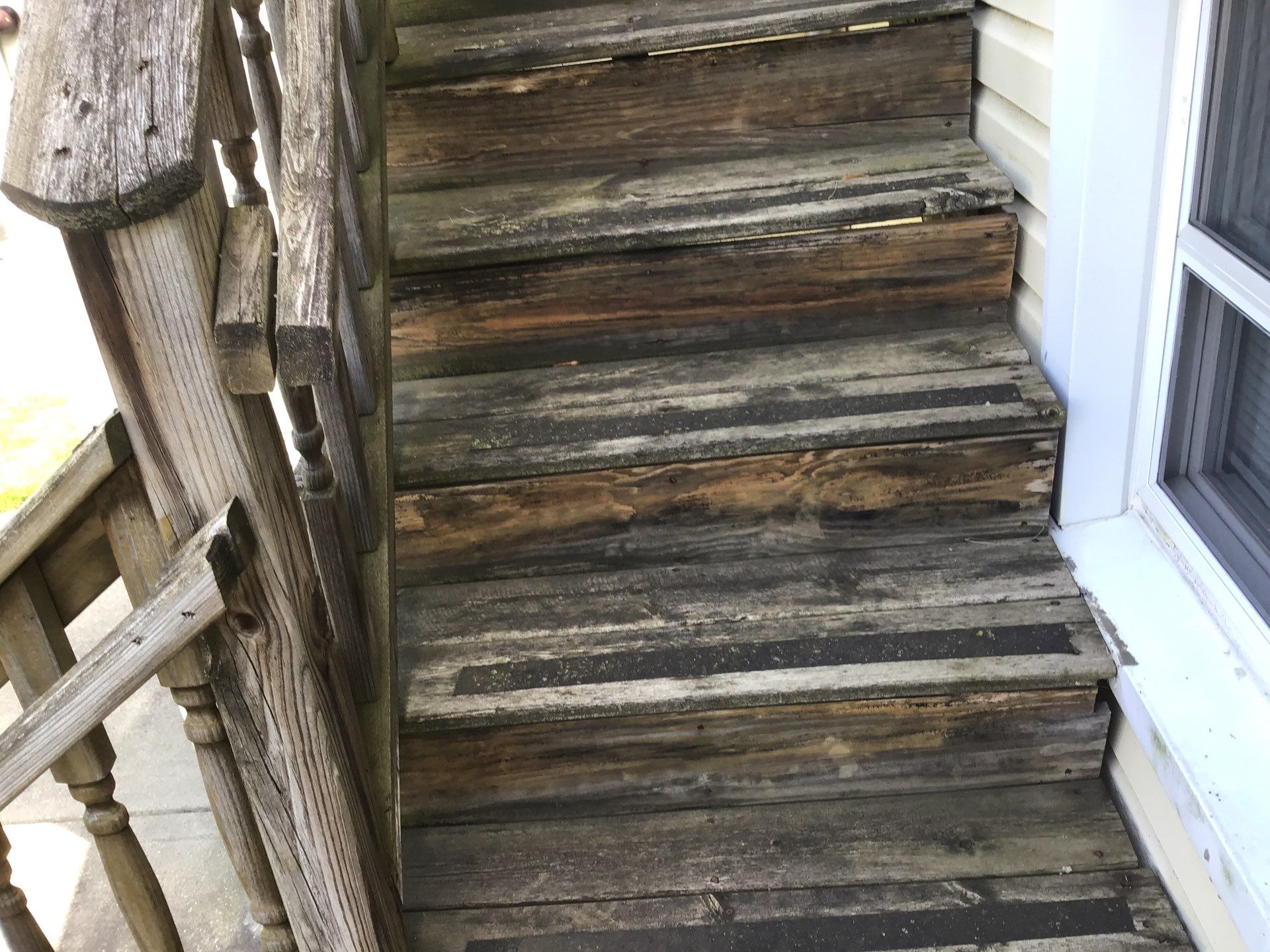 Rebuild balcony flat roofing TREX decking stairway and Railings in Wyandotte, MI by Northwest Construction 