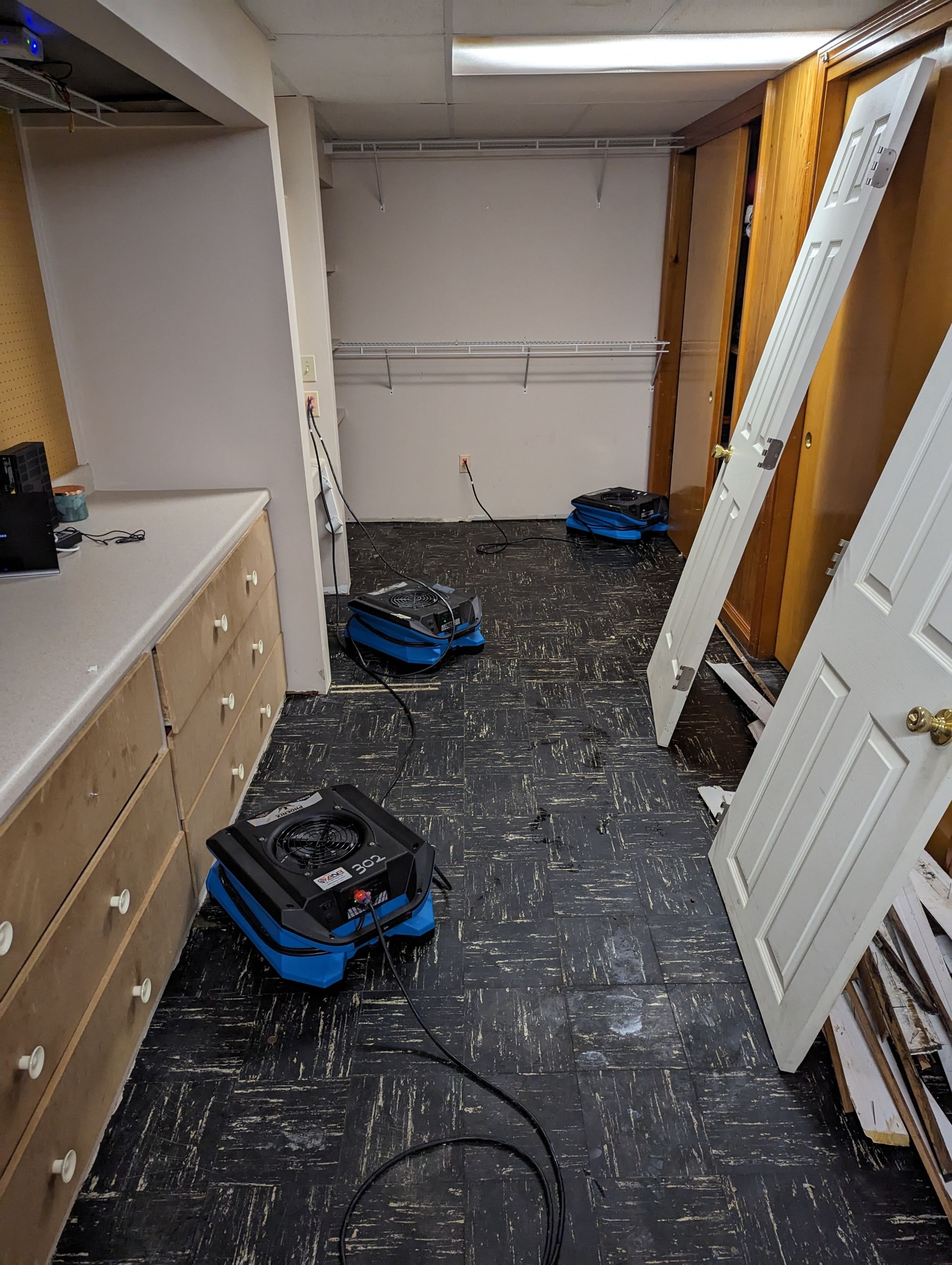 Emergency Service Water Mitigation Using Air Movers and Dehumidifiers by ANR Restoration