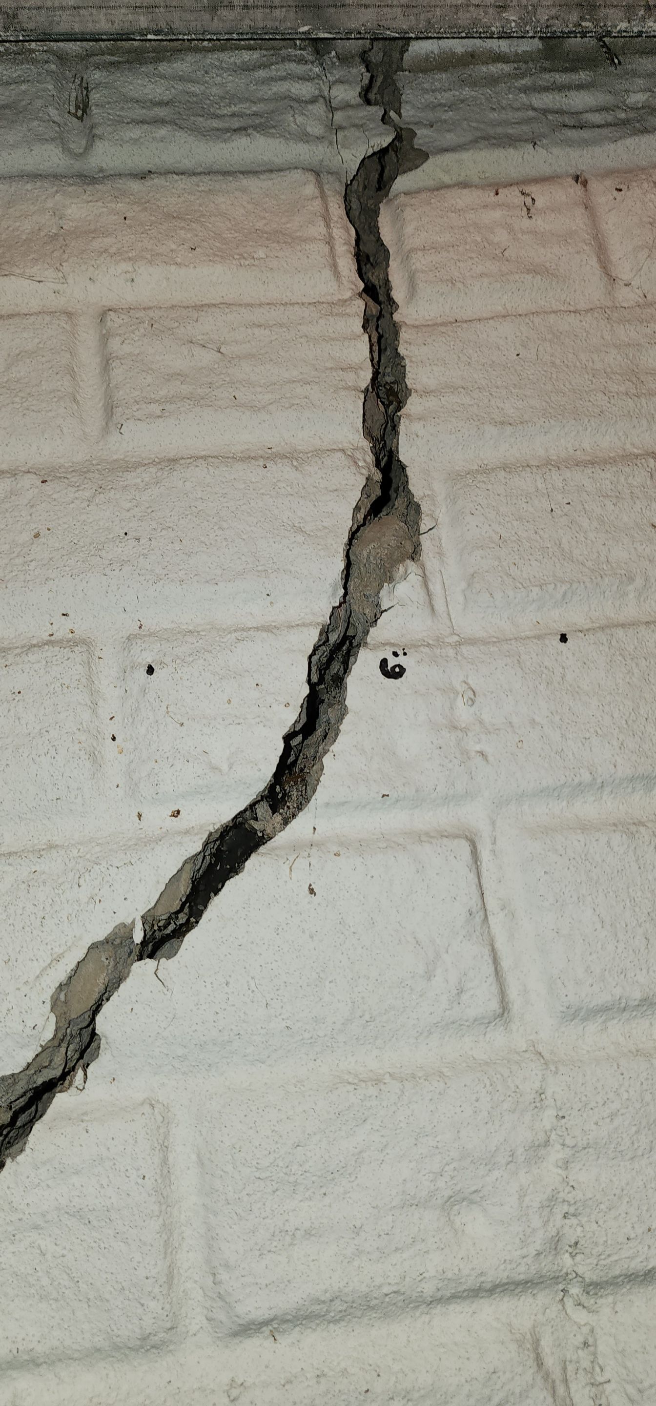 Helical Piers and Wall Crack Injections by Toledo Basement Repair