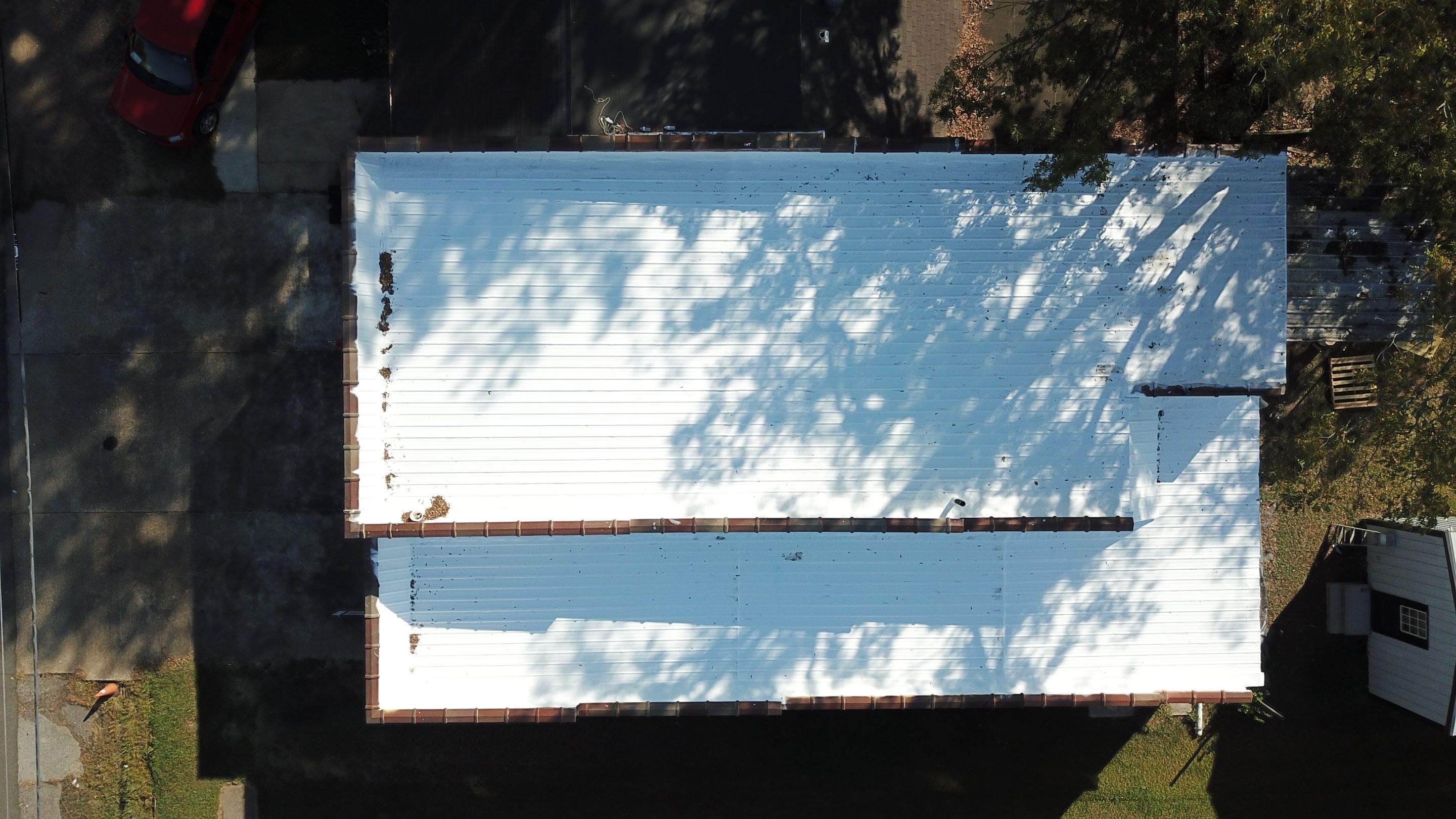 Commercial Roofing Installation using Aldocoat Coatings by Hostetler Roofing