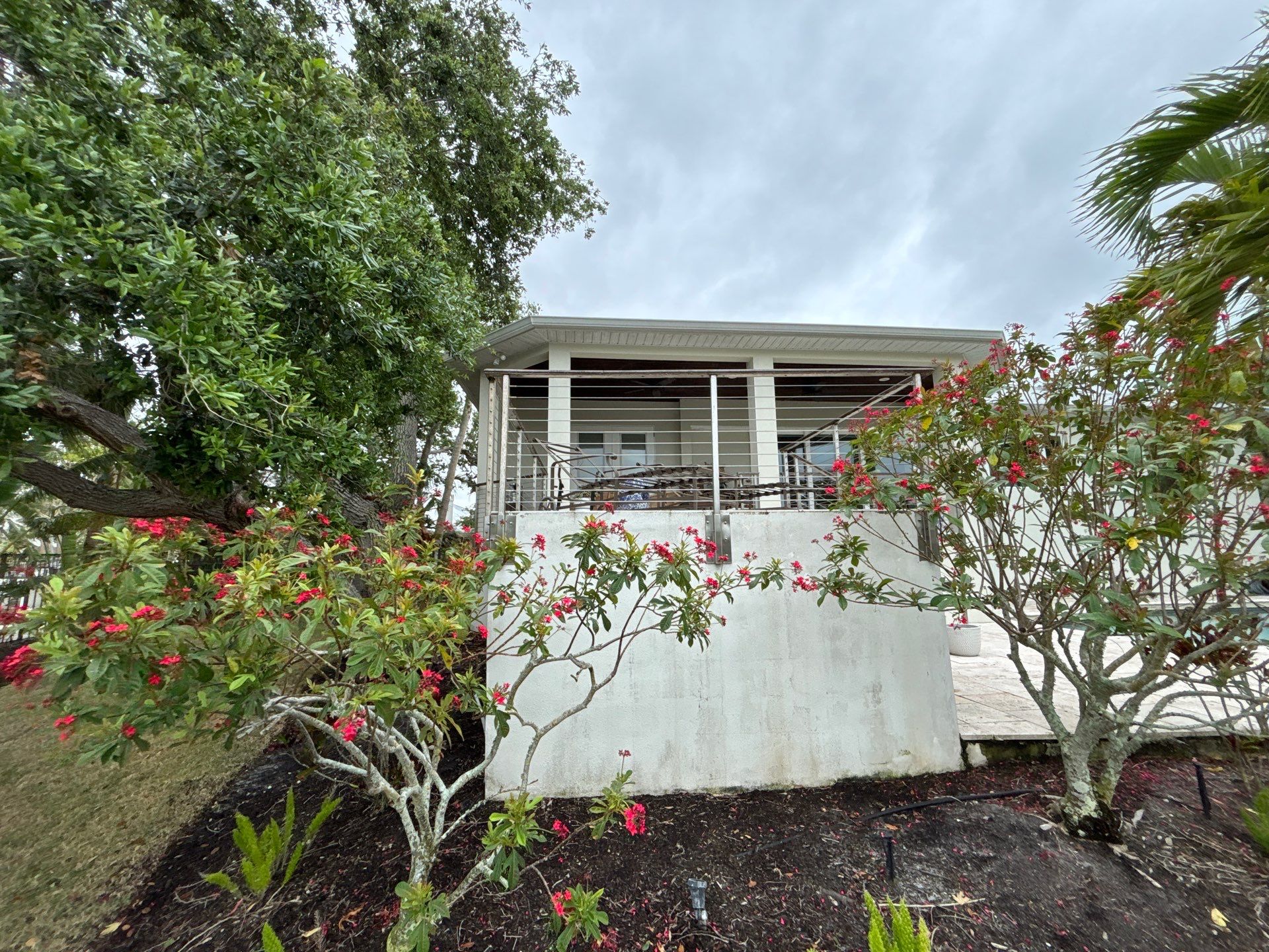 6-Inch White Seamless Gutters Installation in Siesta Key FL by Gutter Professors