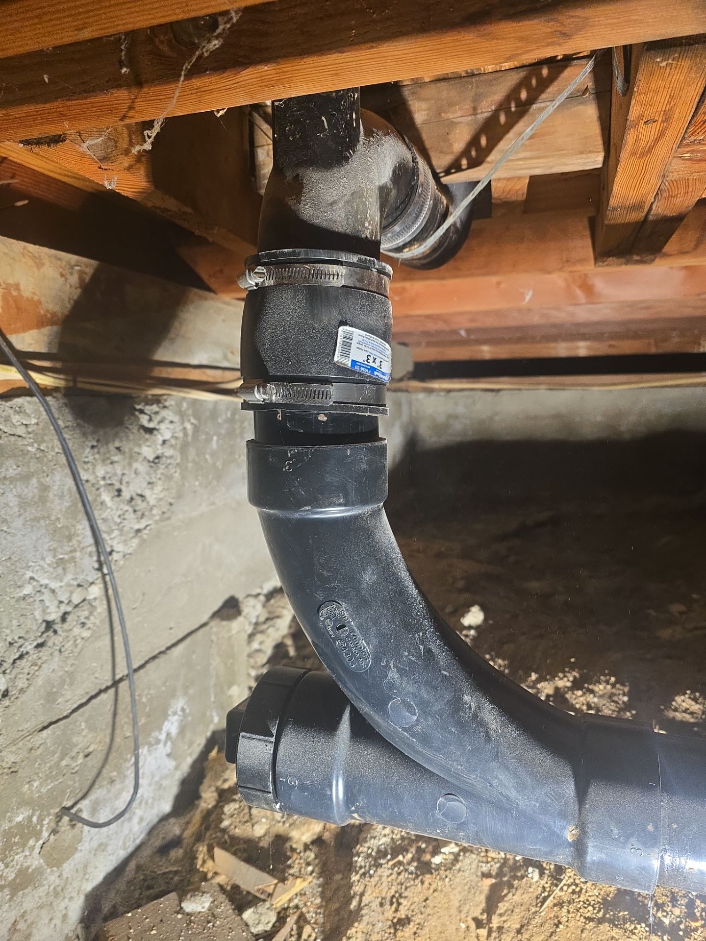 Installation of New Tall Black Piping (Wall to Ceiling) & Underground Piping by Us Plumbing