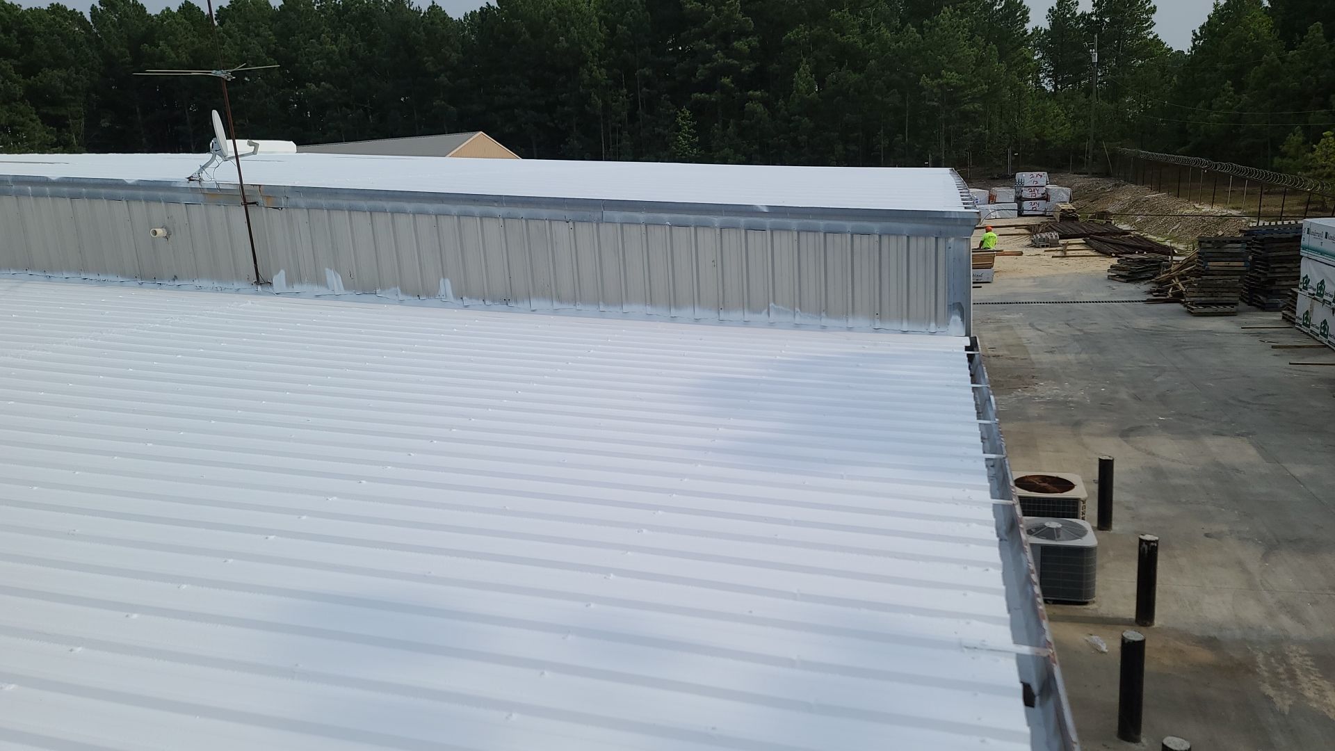 Commercial Roofing Installation using Aldocoat Coatings by Hostetler Roofing