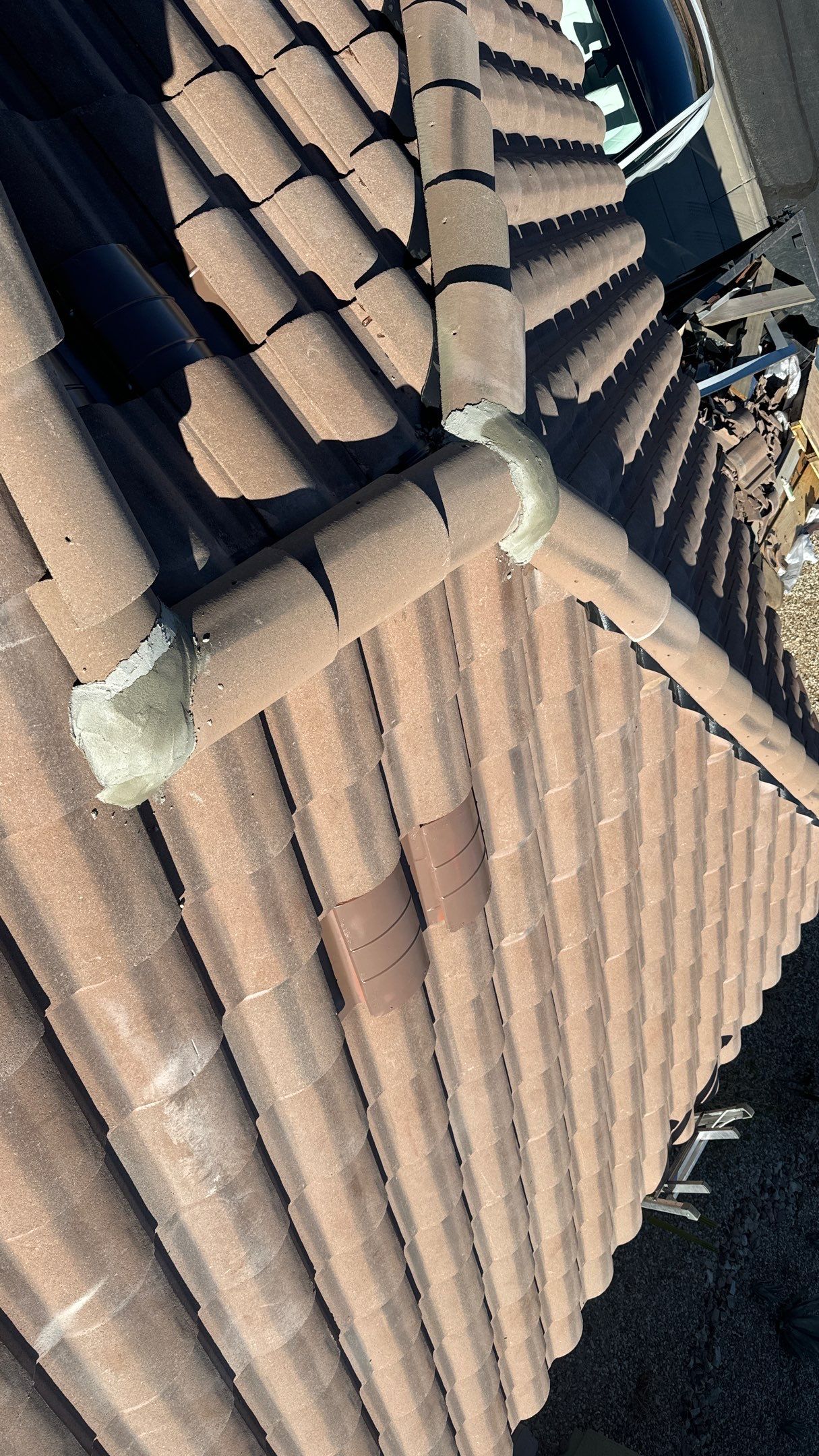 Residential Roofing Installation using Clay Tile by Weather-Tite Exteriors LLC
