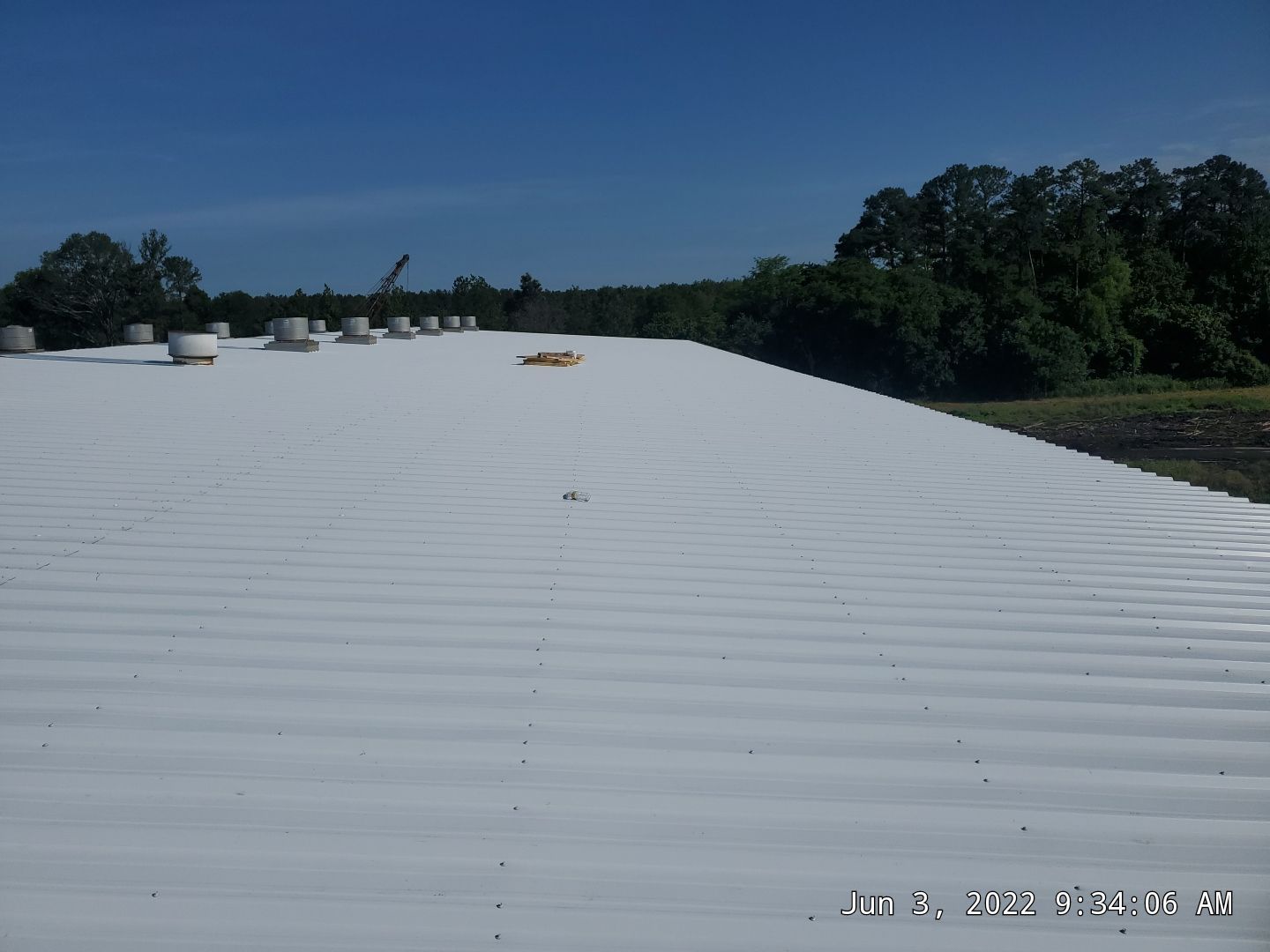 Commercial Roofing Installation using Aluminum Roofing panels by Hostetler Roofing