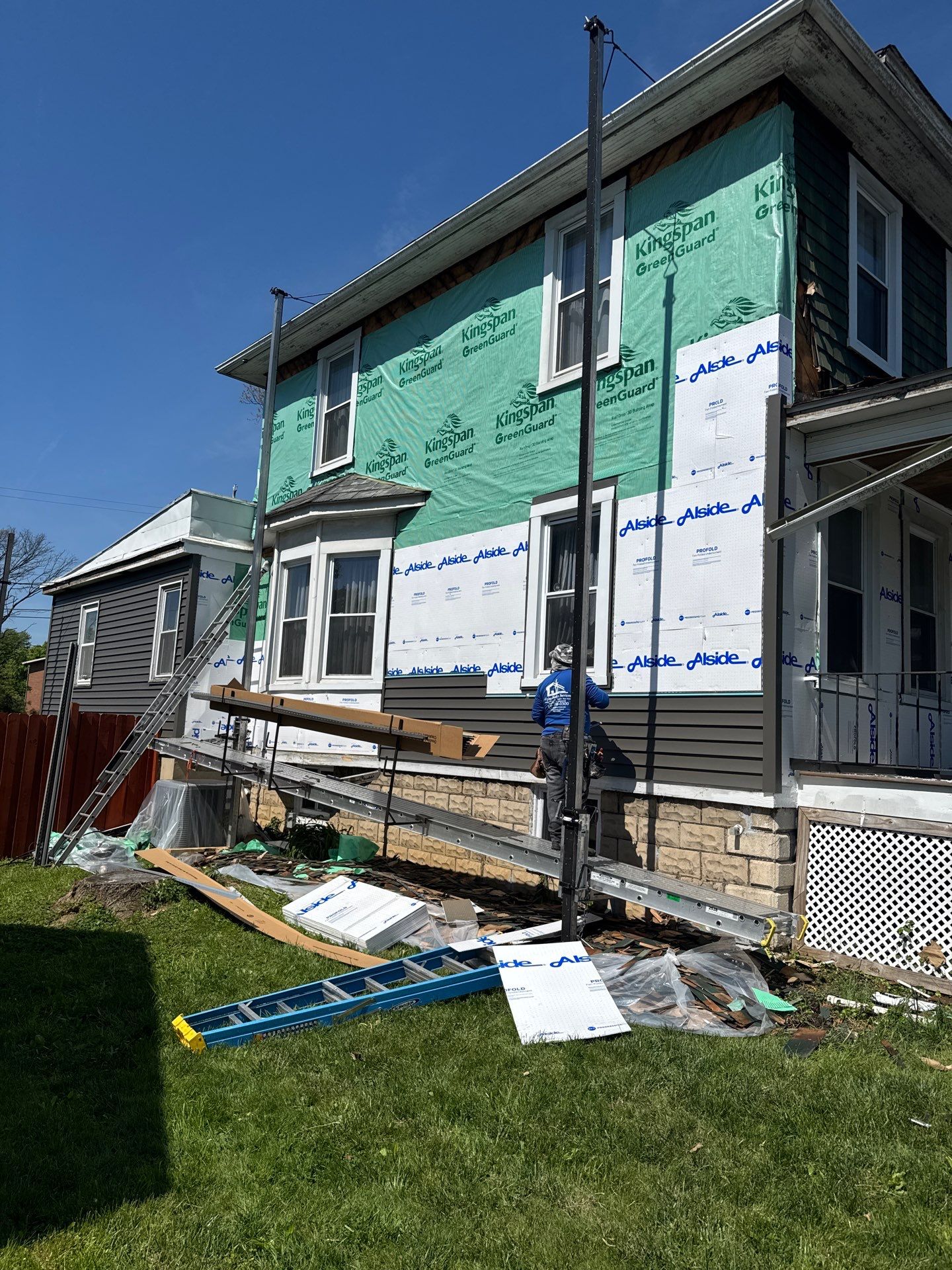New siding & New Gutters by Alpha Design Services