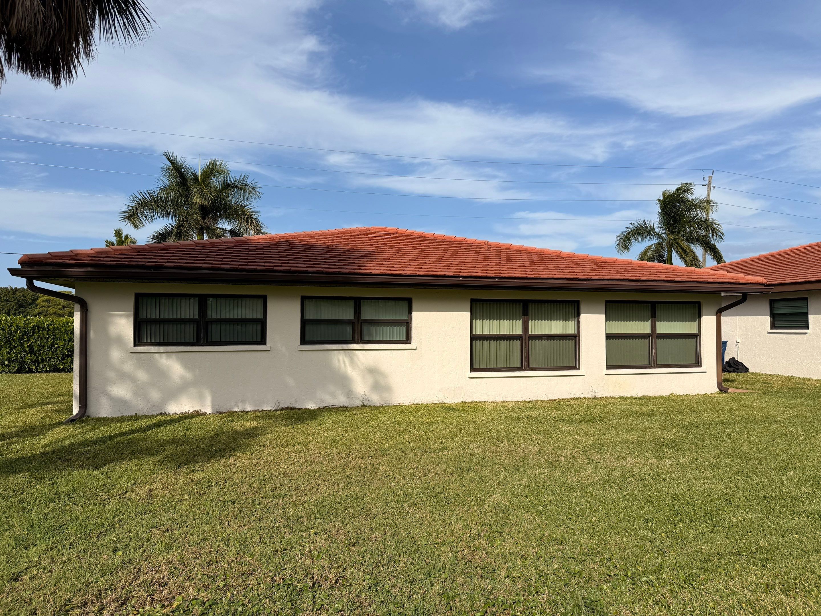 Neighboring Tile Roof Cleanings in Vivienda at Bradenton I – Bradenton, FL by Sunshine AquaWash