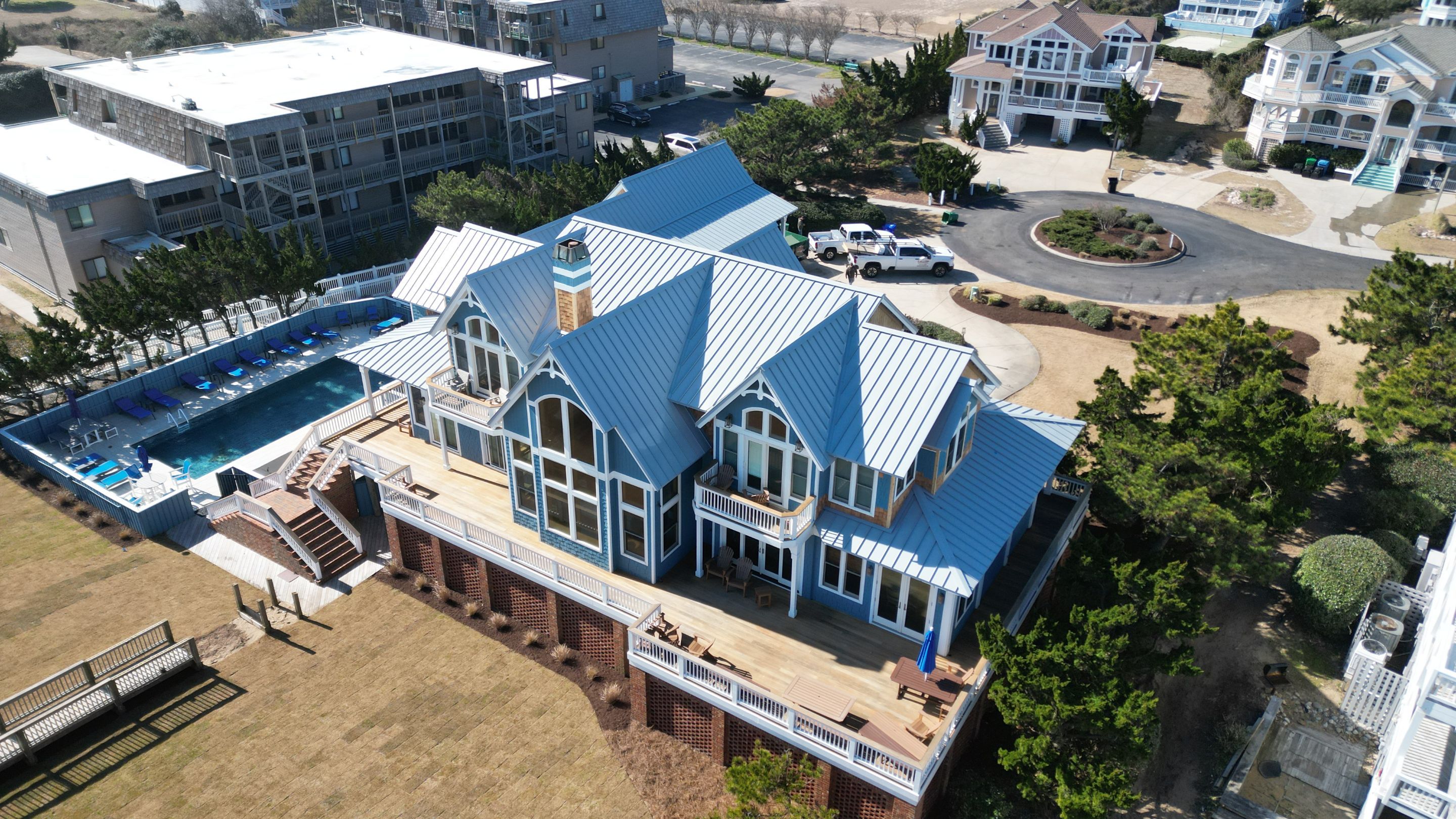 Large Metal Roof Transformation by Gallop Roofing & Remodeling, Inc.
